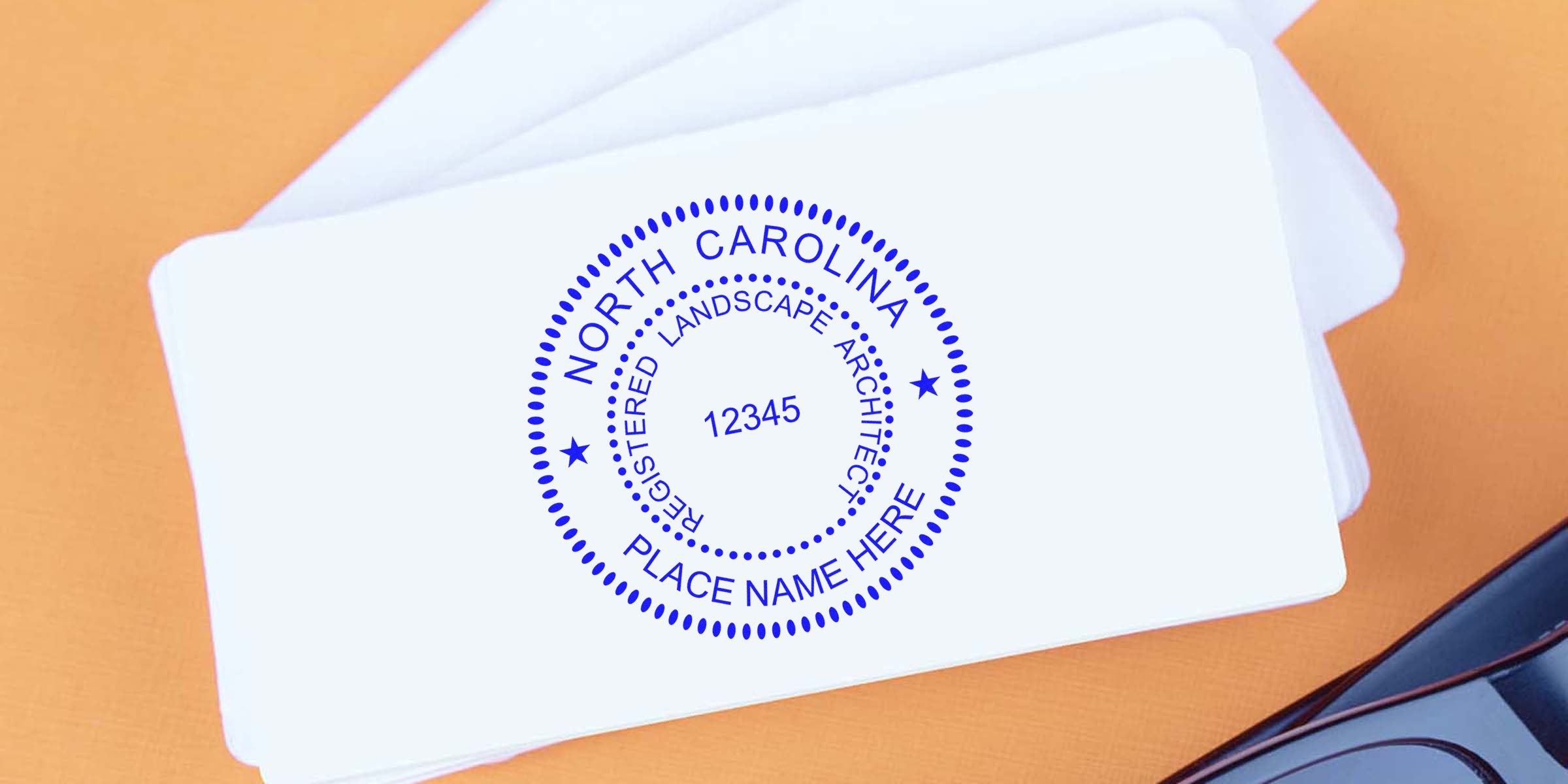 North Carolina landscape architect seal on white cards with a landscape architect seal design.