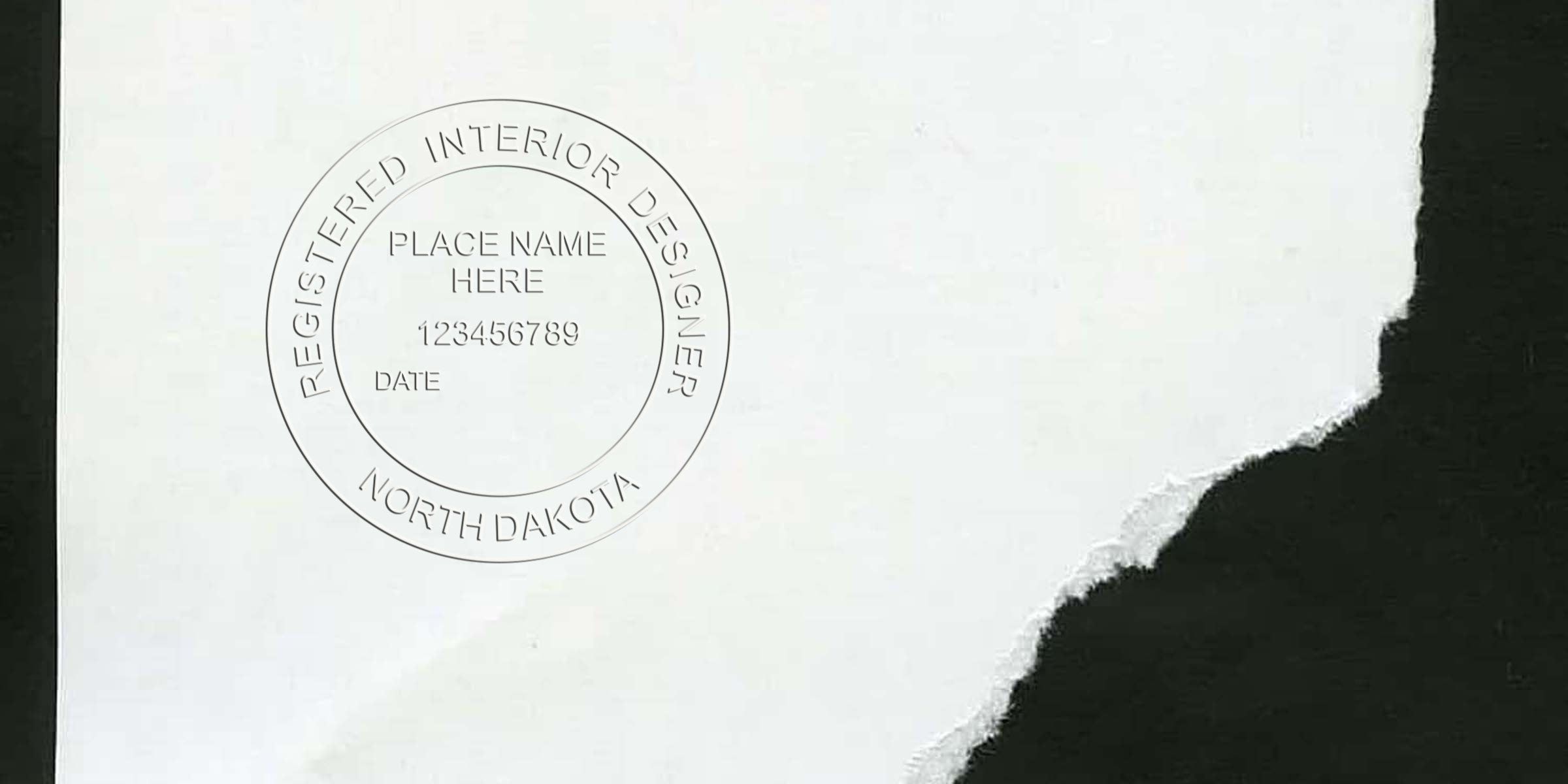 Registered interior designer stamp North Dakota on torn paper with ND interior designer seal and certification.