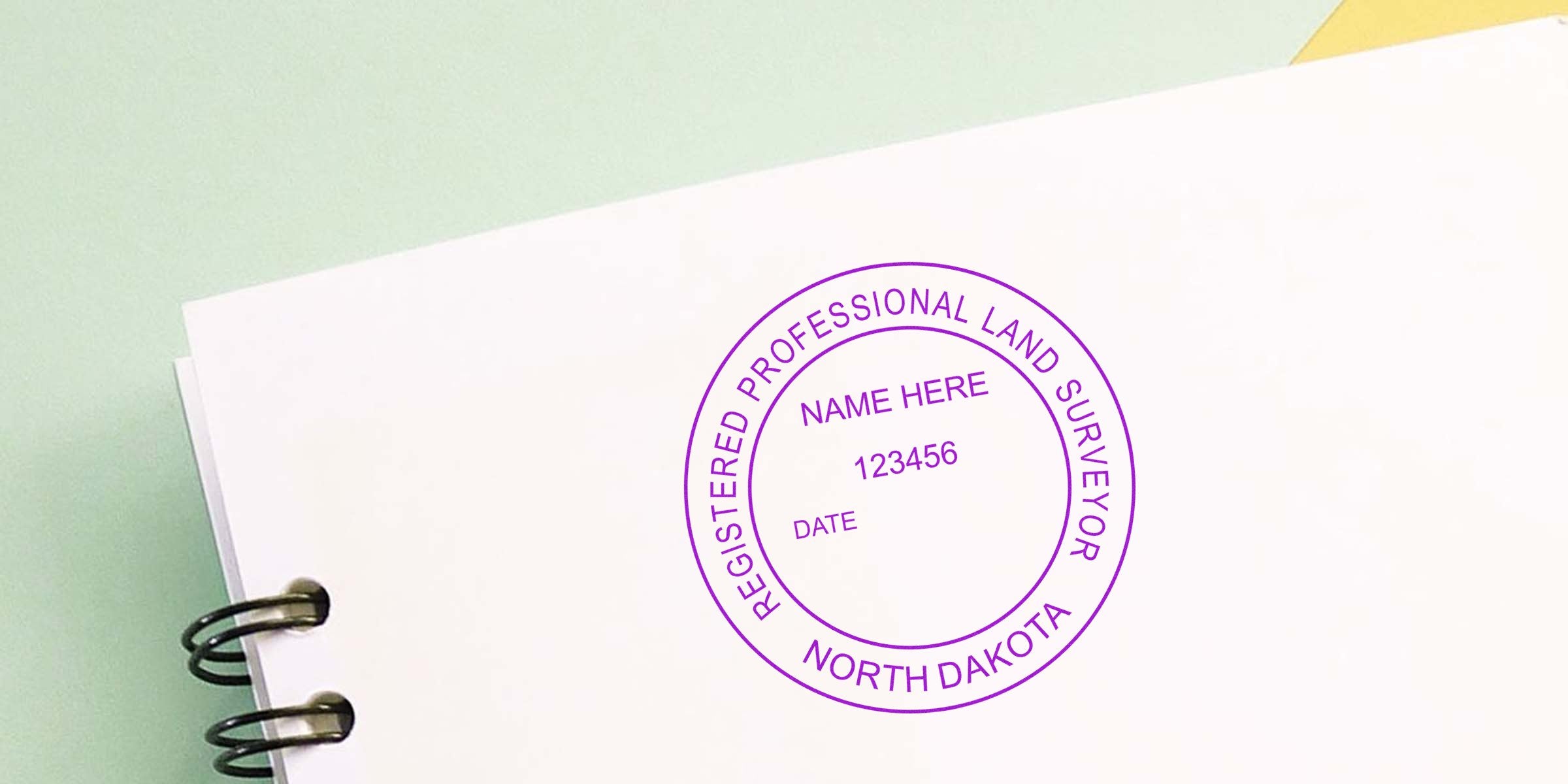 Registered North Dakota professional surveyor stamp on white paper, shown in an online surveyor stamp guide.