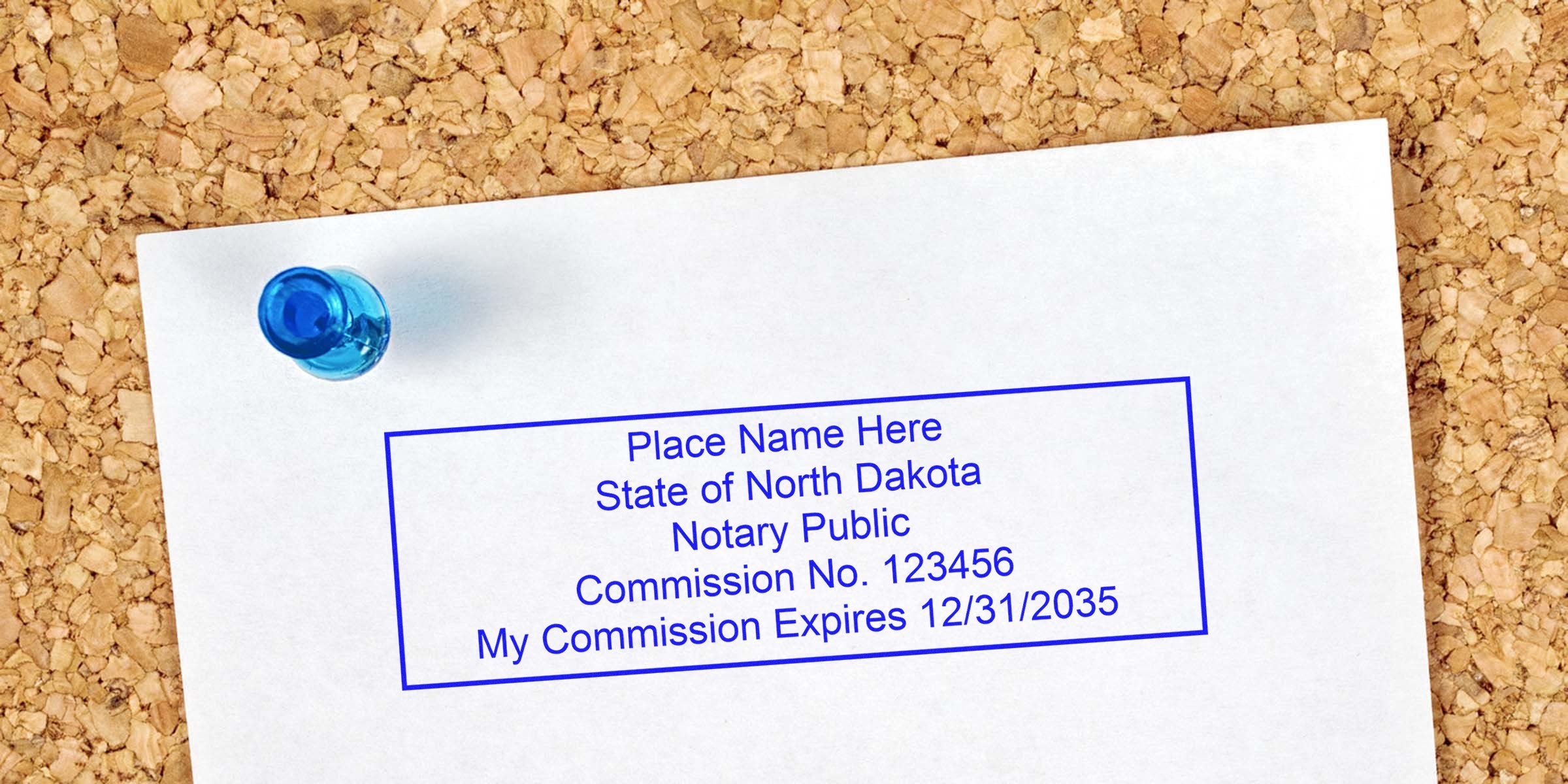 North Dakota notary stamp with commission number and expiration date pinned on corkboard, shown in a notary public guide.