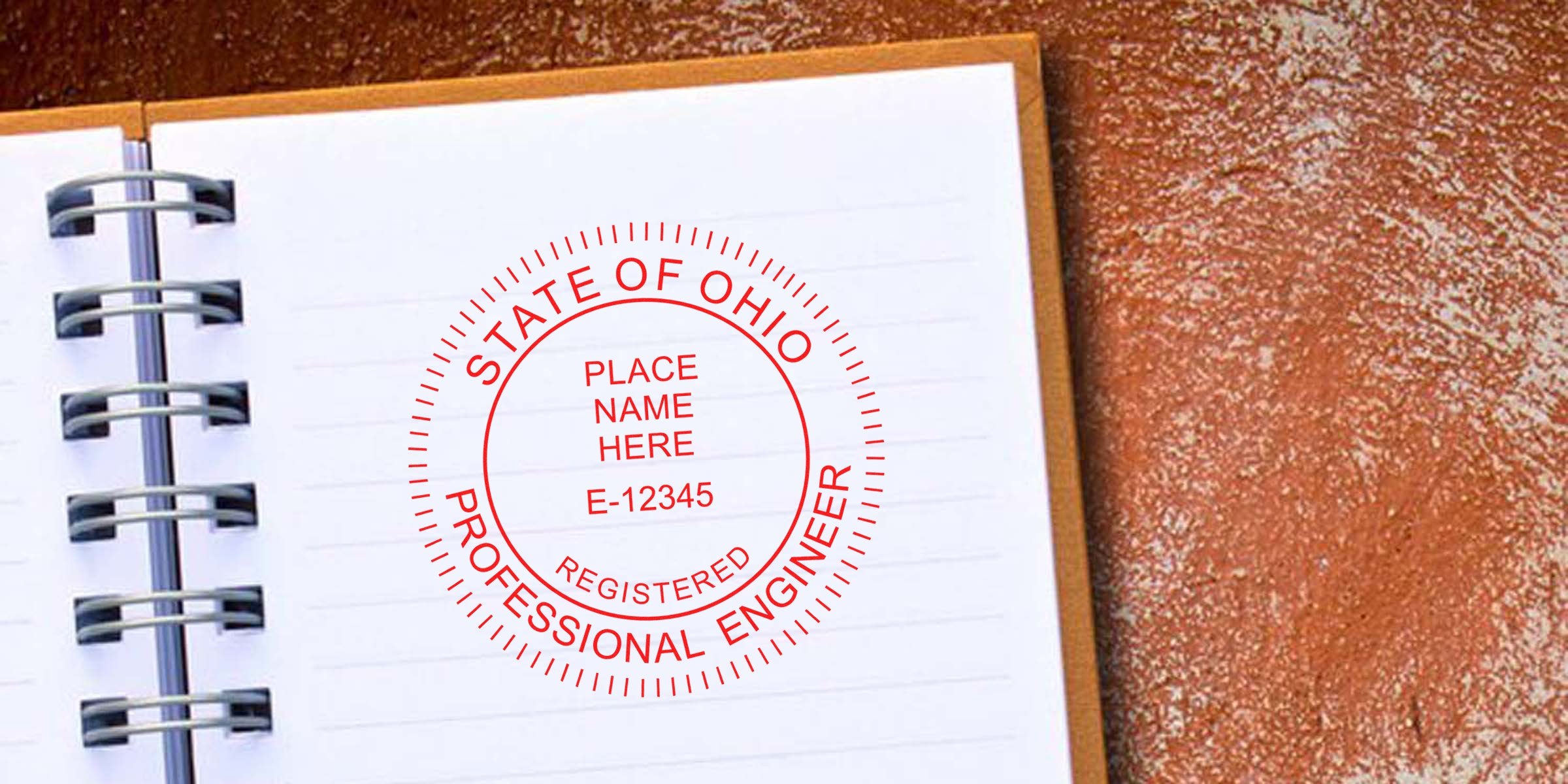 Ohio professional engineer stamp on notebook for certification and license verification from a trusted stamp vendor.