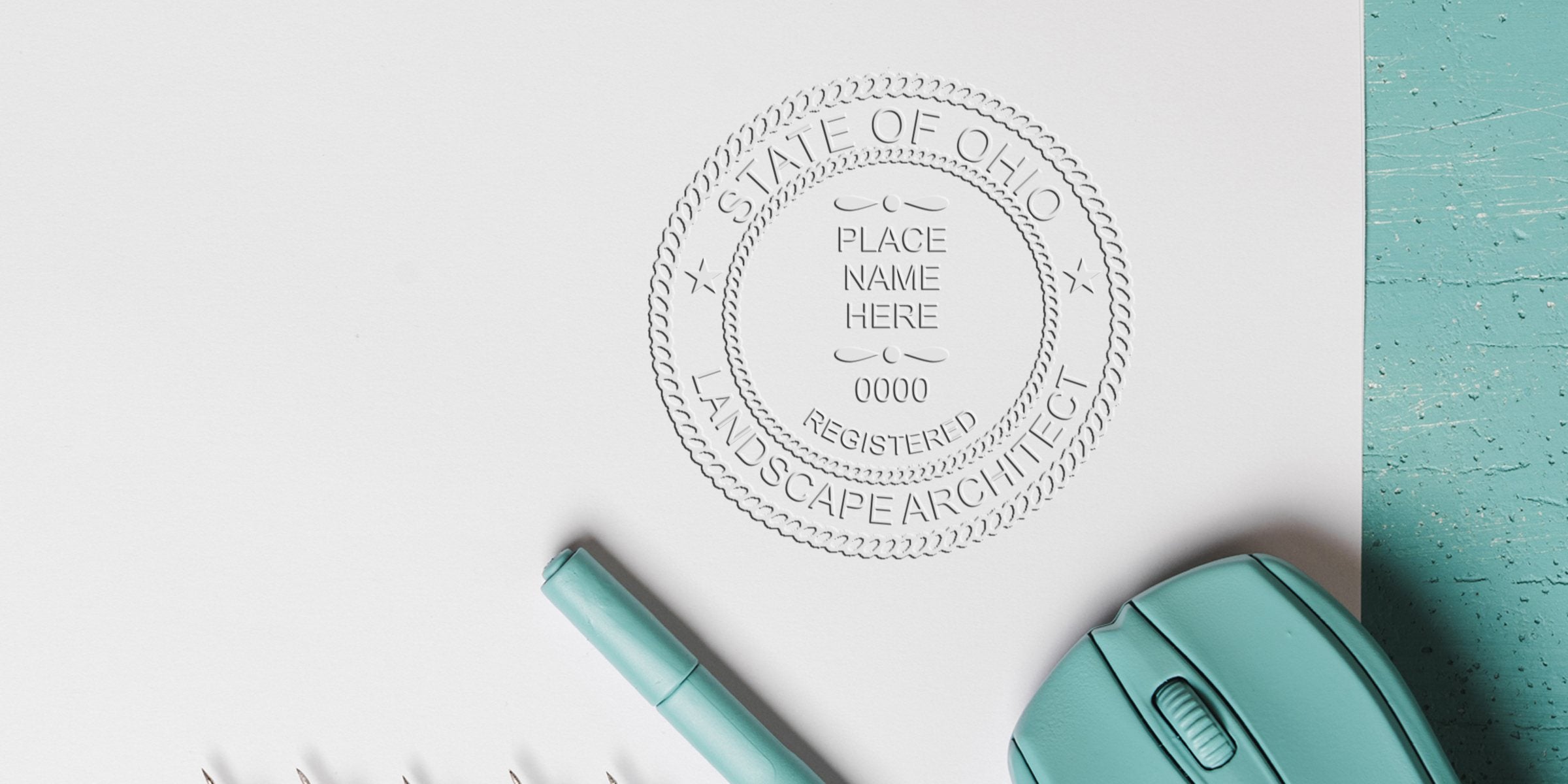 Ohio landscape architect’s embossed seal on white paper, with seal details, a turquoise pen, and a computer mouse on a wooden desk.