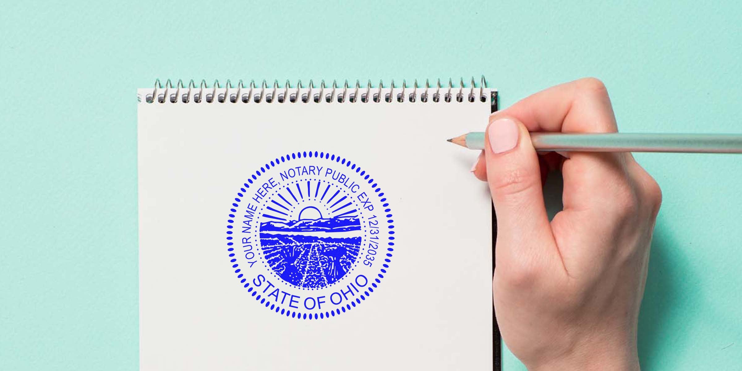 Ohio notary stamp on white notebook held by hand with pencil for document verification, featuring Ohio seal purchase and buy options.