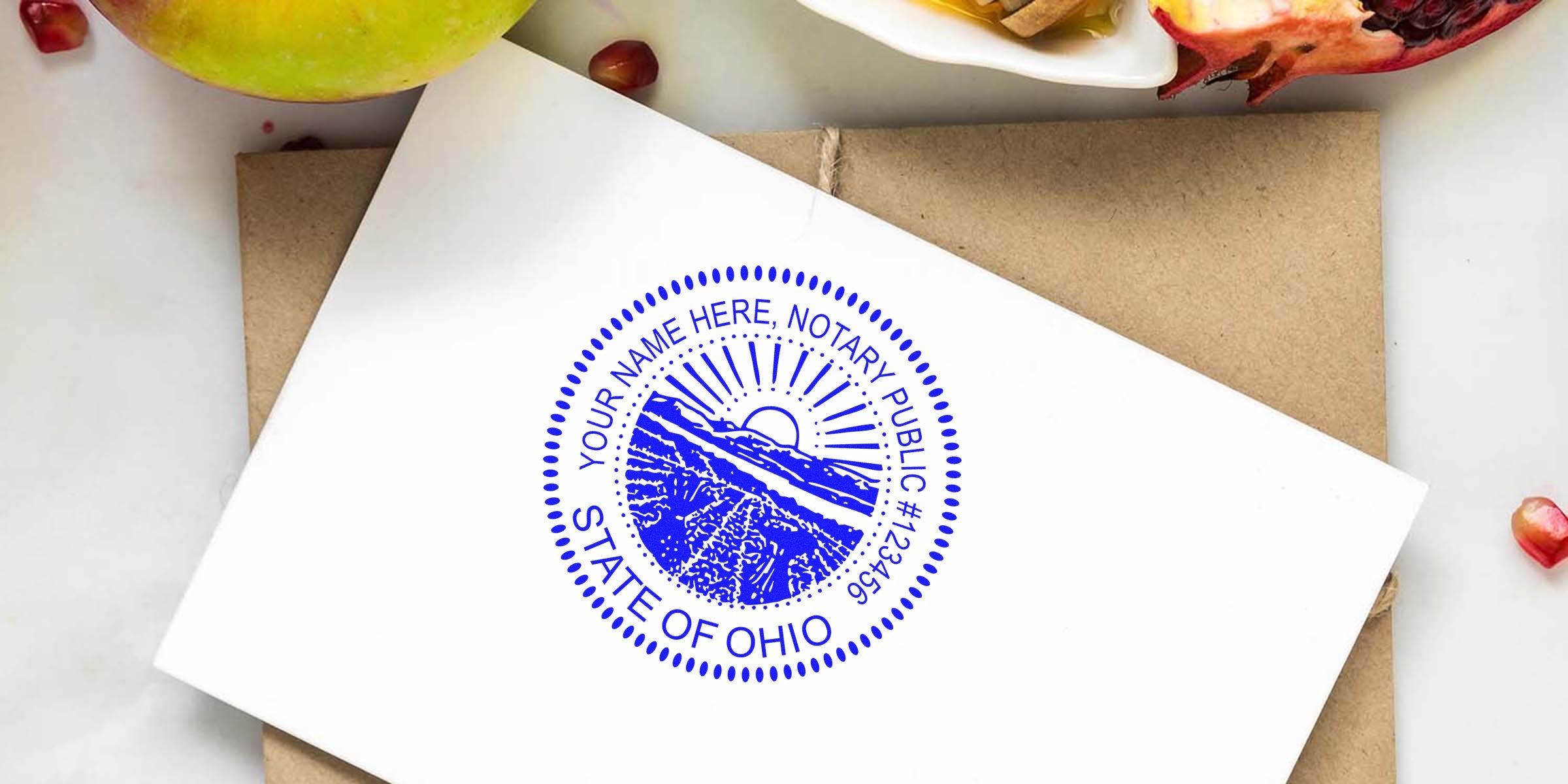 Ohio notary seal stamp on white envelope with natural background and fruits, ideal for anyone seeking to buy an Ohio notary seal.