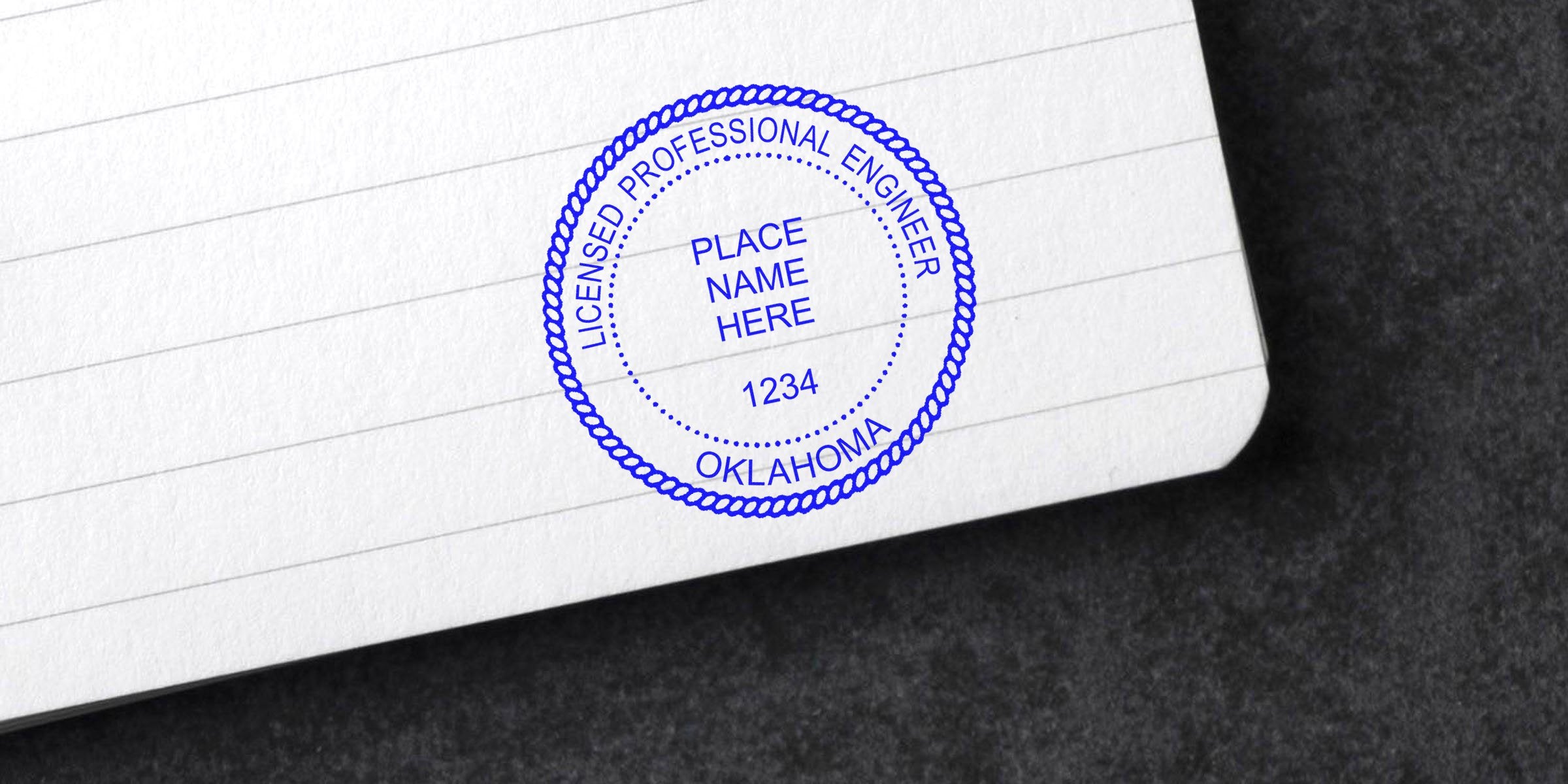 Oklahoma engineer stamp in blue ink on white paper, showing compliance with engineering project standards.