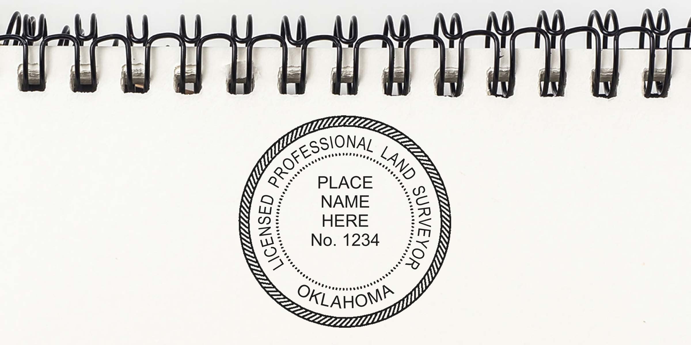 Licensed Oklahoma land surveyor seal stamped on notebook paper, made by a professional land surveyor seal maker.