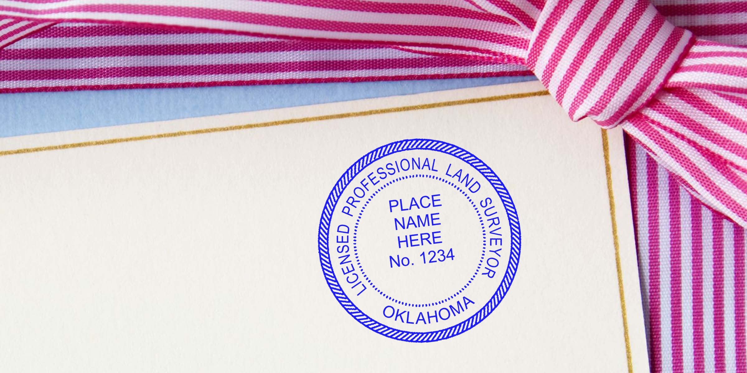 Licensed Oklahoma professional land surveyor seal on official document with decorative pink striped ribbon, showing seal size and meeting Oklahoma land surveyor seal requirements.