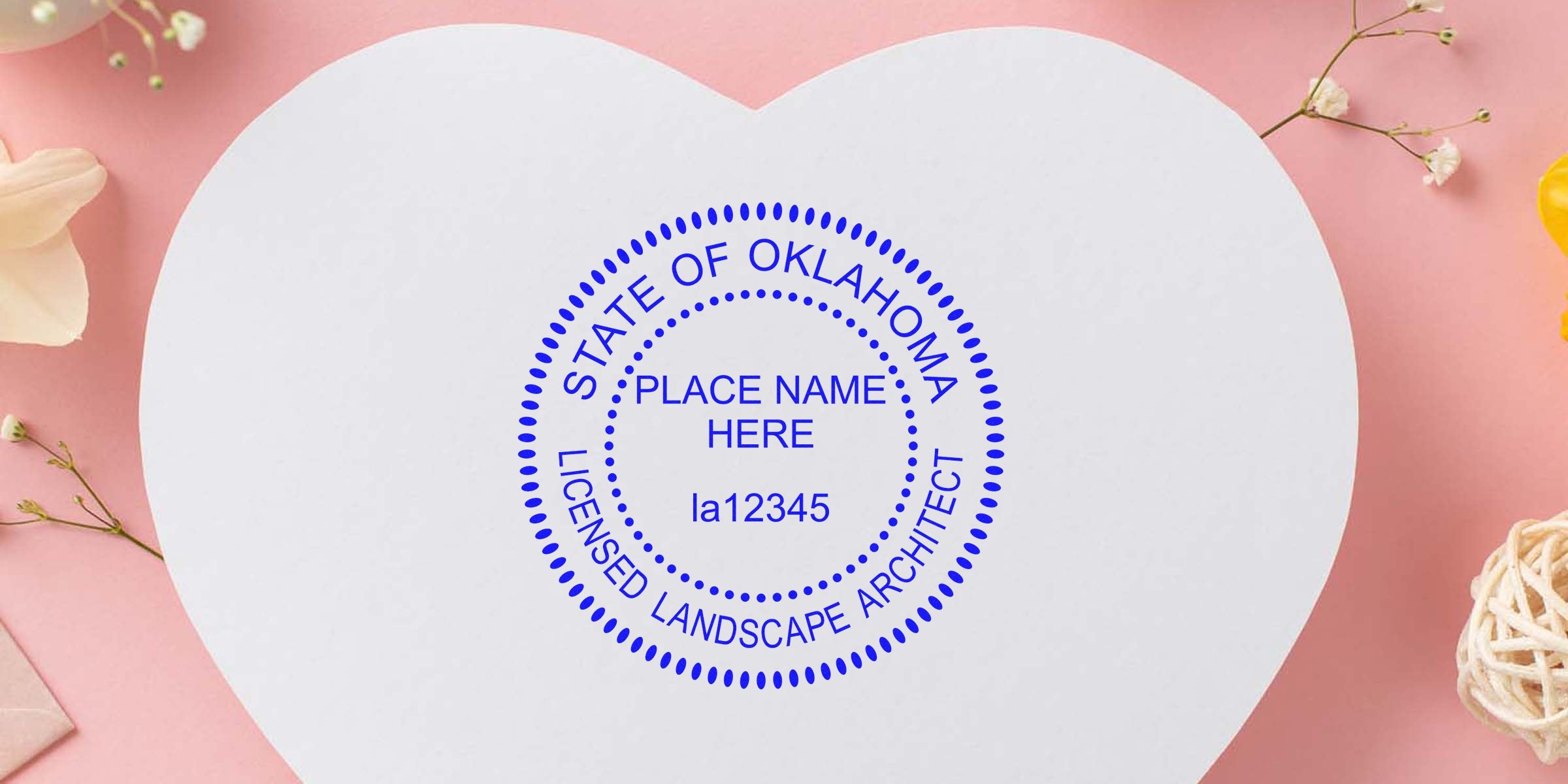 Oklahoma Landscape Architect Seal embossed on heart-shaped paper with a floral background using a Landscape Architect Seal Embosser.