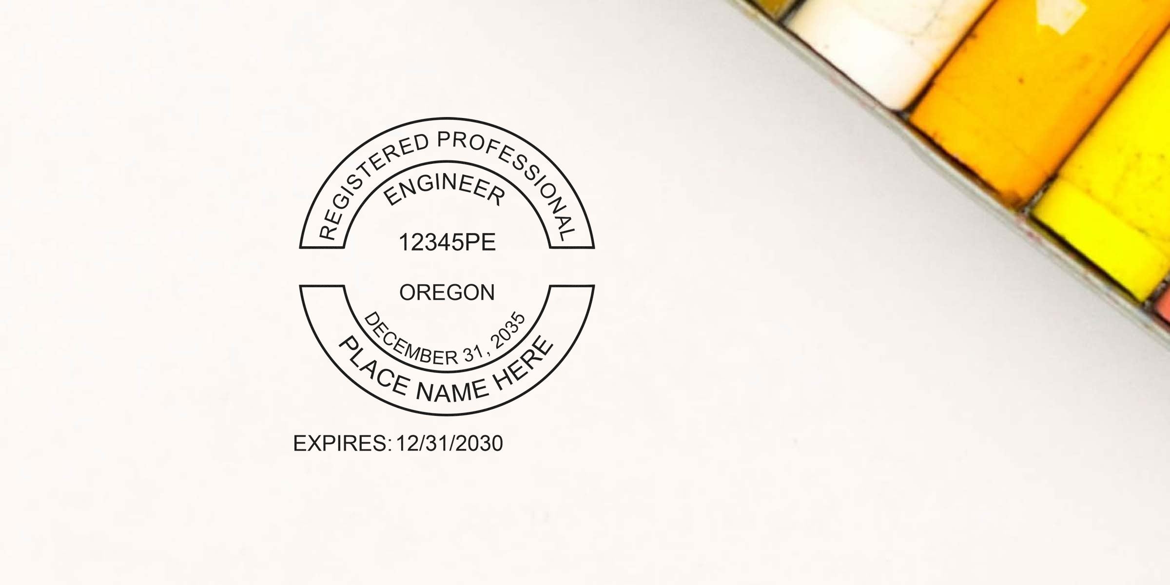 Oregon PE stamps with a registered professional engineer mark, made using colored pastels on white paper, displaying custom engineering stamps.