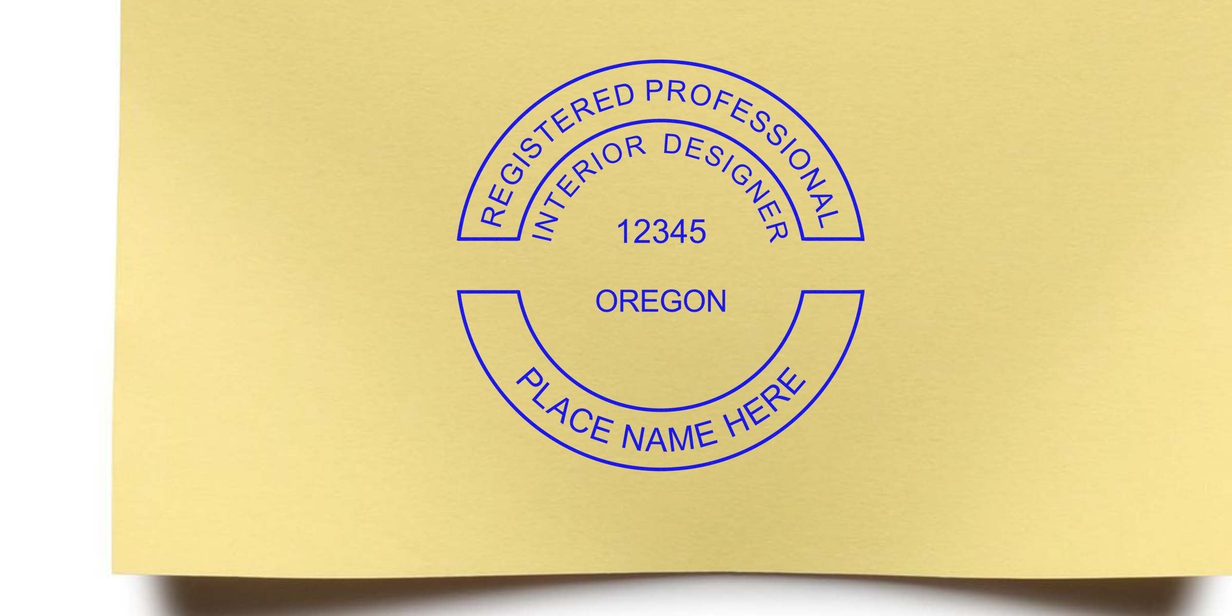 Oregon interior designer stamp with license number on yellow paper for certification verification, representing Oregon interior design licensing.