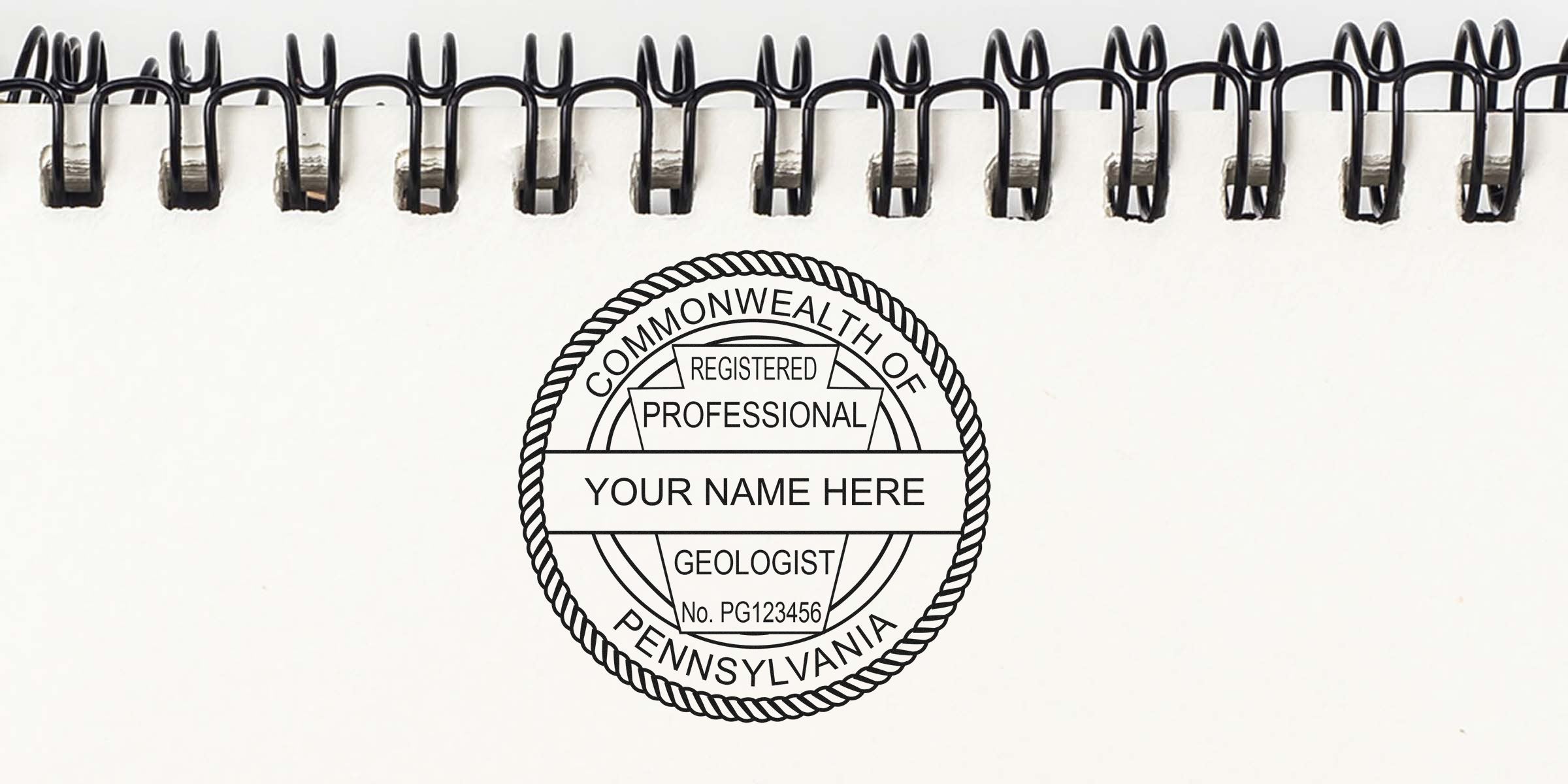 Pennsylvania geologist stamp seal for registered professional geologist certification on a notebook page, showing the selection of a PA geologist stamp.