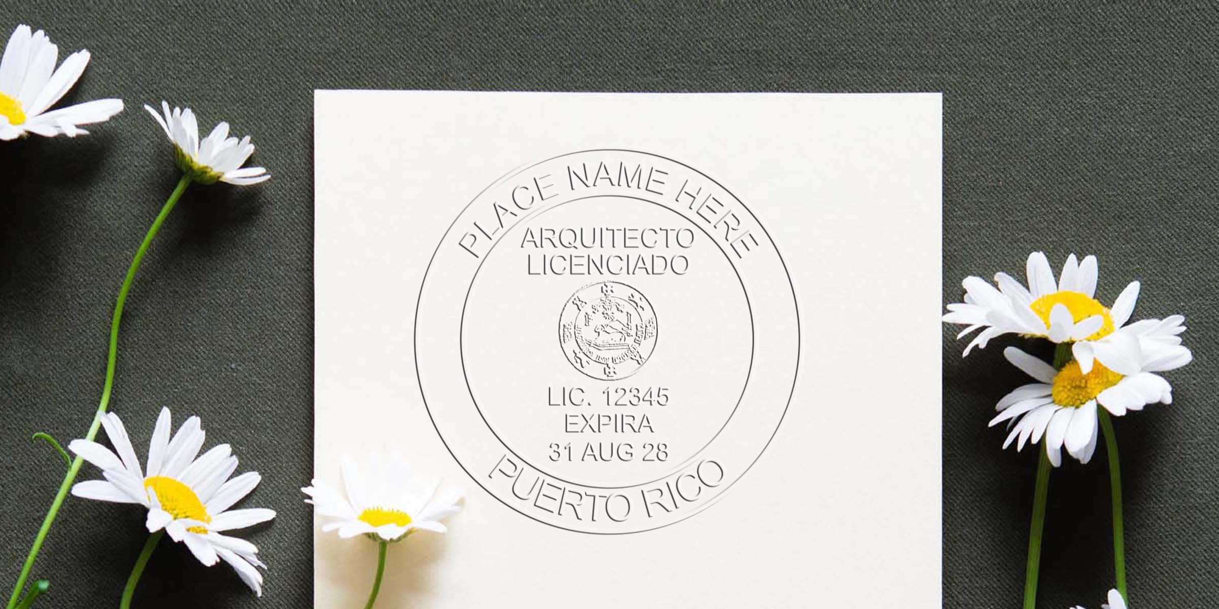 Puerto Rico architect stamp on white paper with daisies on dark fabric, showing professional architect seal Puerto Rico.
