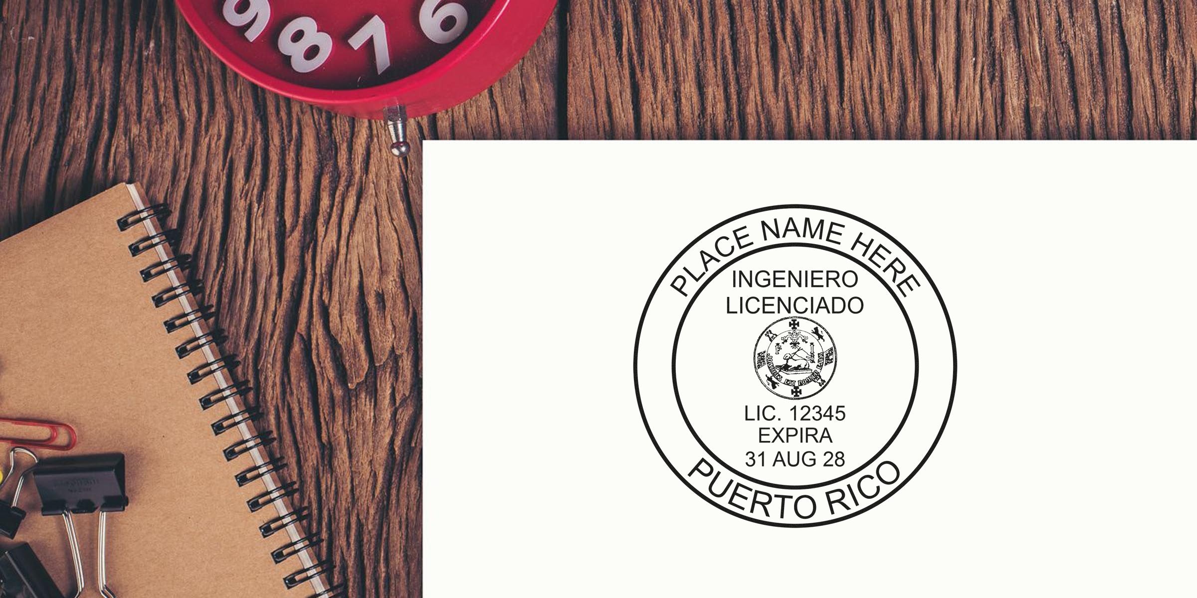 Puerto Rico licensed engineer stamp on white paper with notebook and red clock on wooden table, showing Puerto Rico engineer stamp laws and requirements.