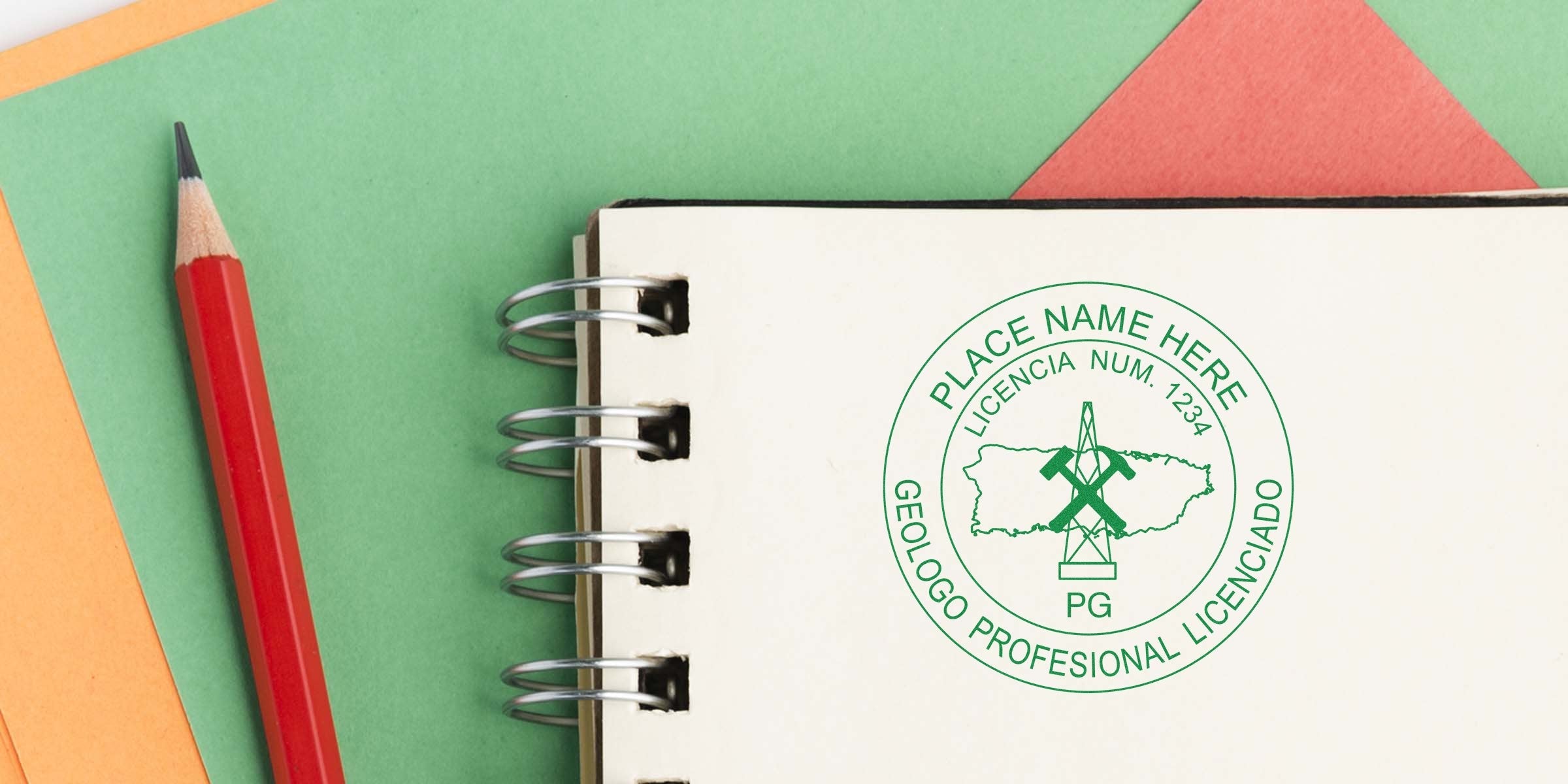 Licensed geologist stamp on notebook with red pencil and colorful background, highlighting Geologist Seal Auction. Join us and attend the Geologist Auction event!