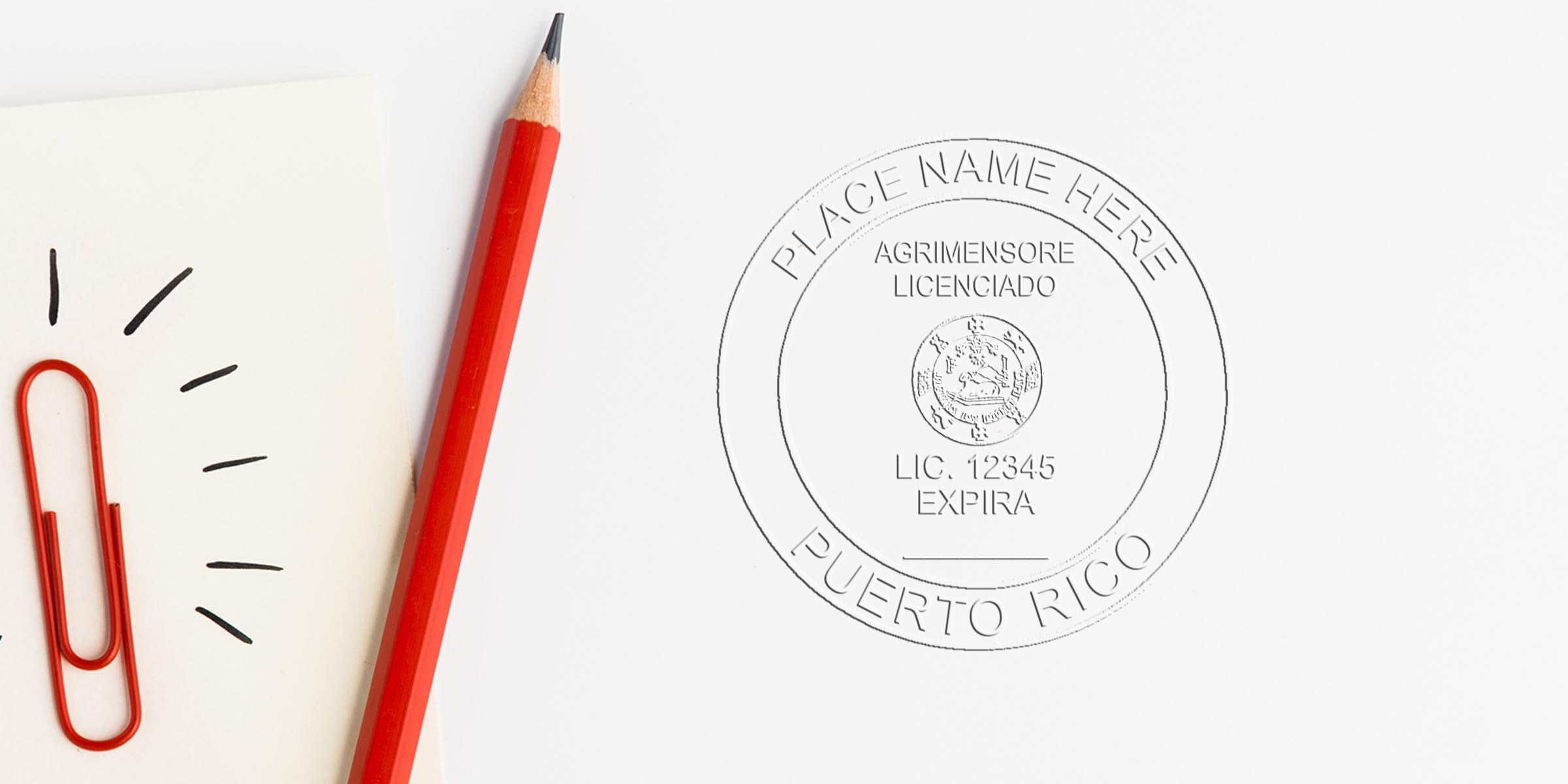Red pencil and paperclip beside a licensed Puerto Rico land surveyor stamp with an embossed seal.