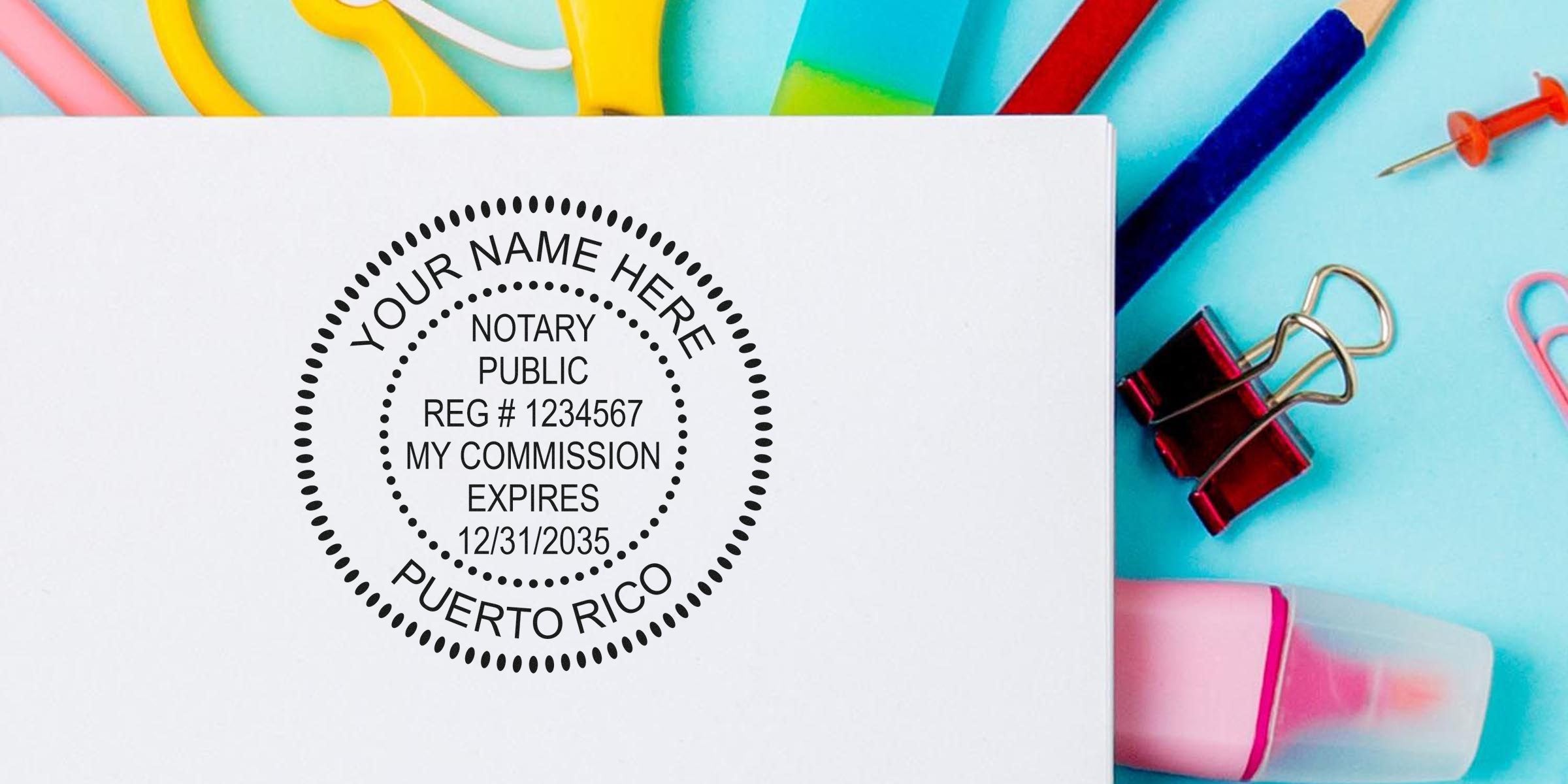 Puerto Rico notary stamp on white paper with office supplies; order your notary stamp online today.