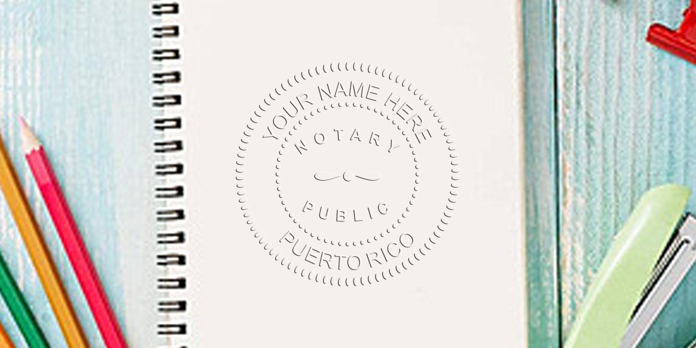 Puerto Rico notary stamp on notebook with colored pencils and stapler, showcasing key features of the Puerto Rico notary seal.
