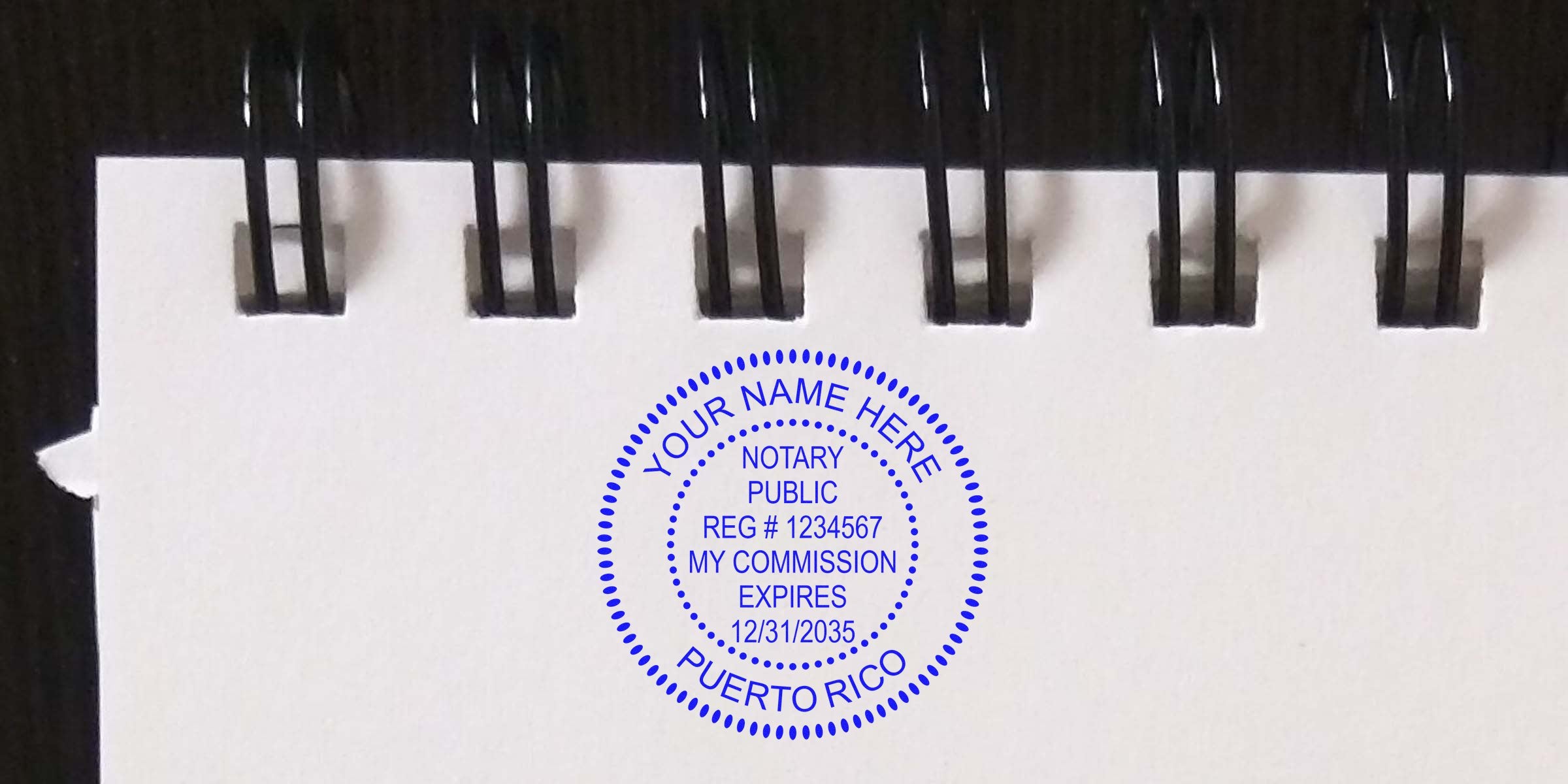 Notary public stamp on spiral notebook paper showing commission expiration, Puerto Rico notary seal, and registration mark; essential tips for those seeking to become a notary in Puerto Rico.