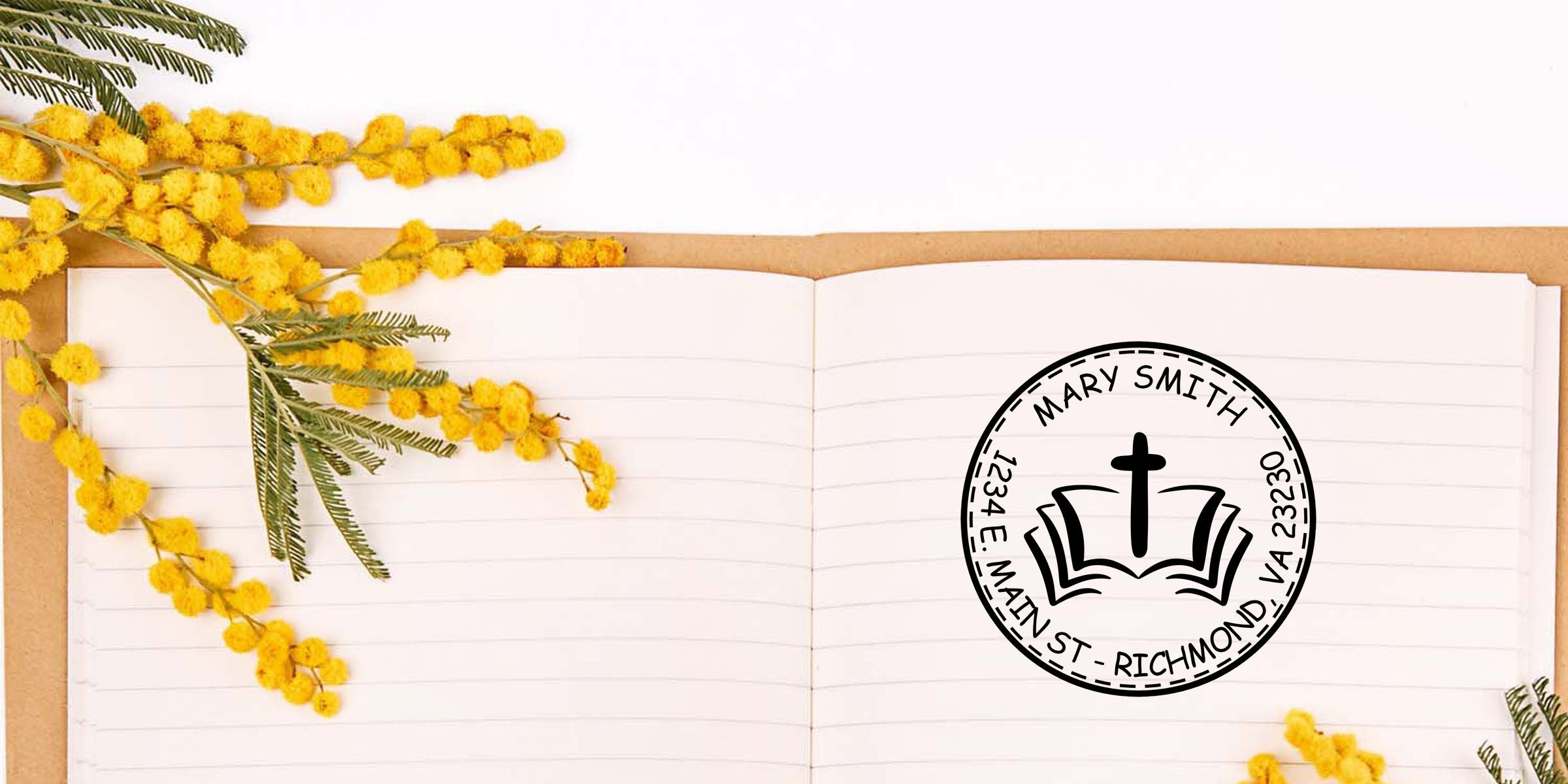 Open lined notebook with yellow mimosa flowers and a custom church stamp logo reading Mary Smith, 1234 E. Main St., Richmond, VA 23230.