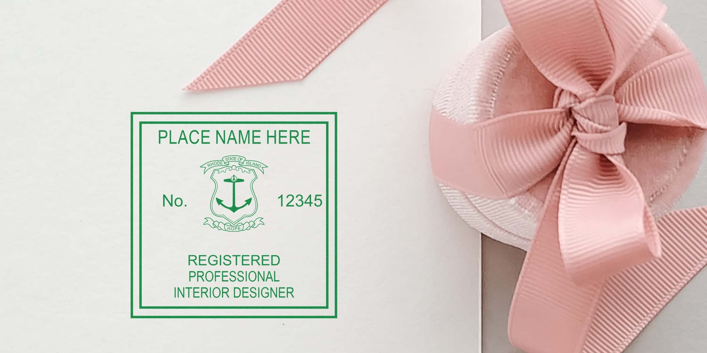 Rhode Island interior designer seal with a pink ribbon bow on white, symbolizing licensed professional interior design in Rhode Island.