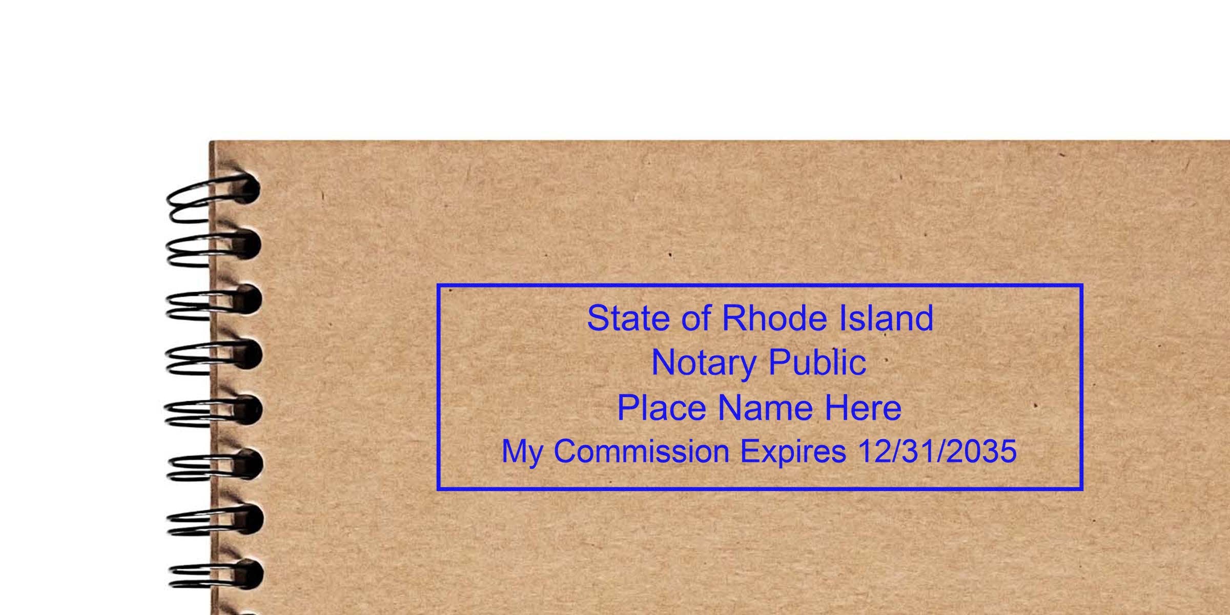 Notary Seal Rhode Island stamp with commission expiry date on brown spiral notebook. Order your Notary Seal RI today.