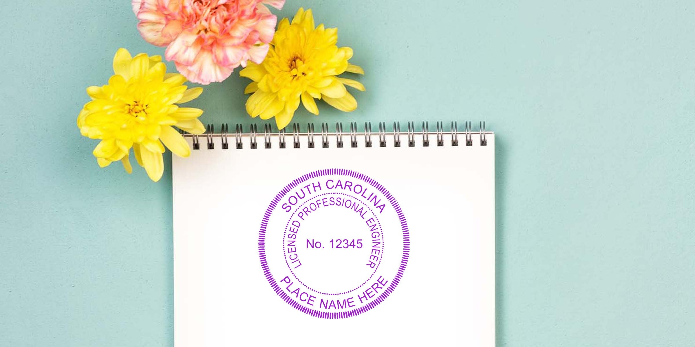 South Carolina licensed engineer stamp with SC Engineer Seal on white notebook, surrounded by yellow and pink flowers on a blue background, highlighting perfect seal design.