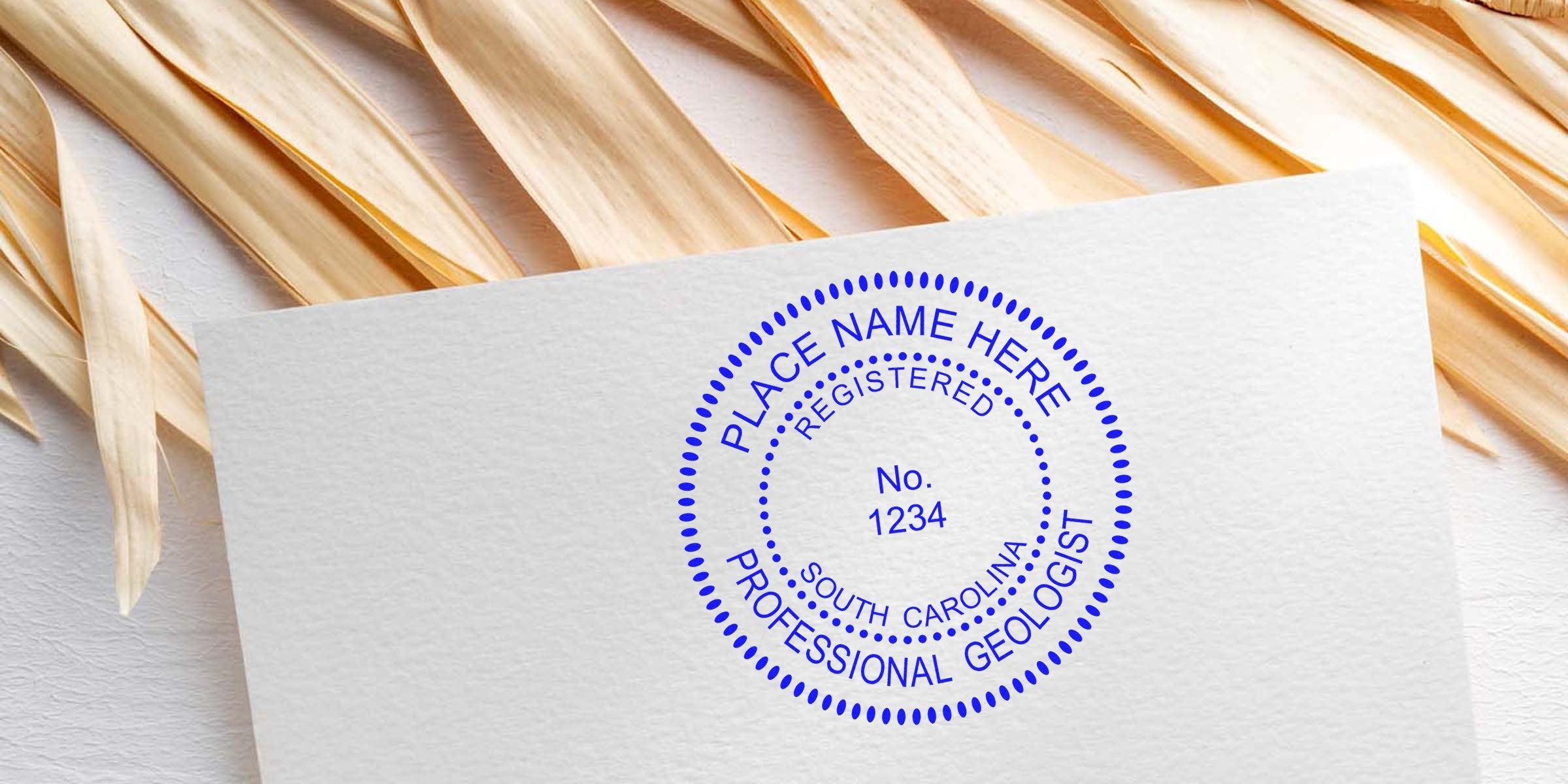 South Carolina professional geologist stamp on white paper with a natural wooden background, highlighting SC geologist stamps and geological embossing methods.