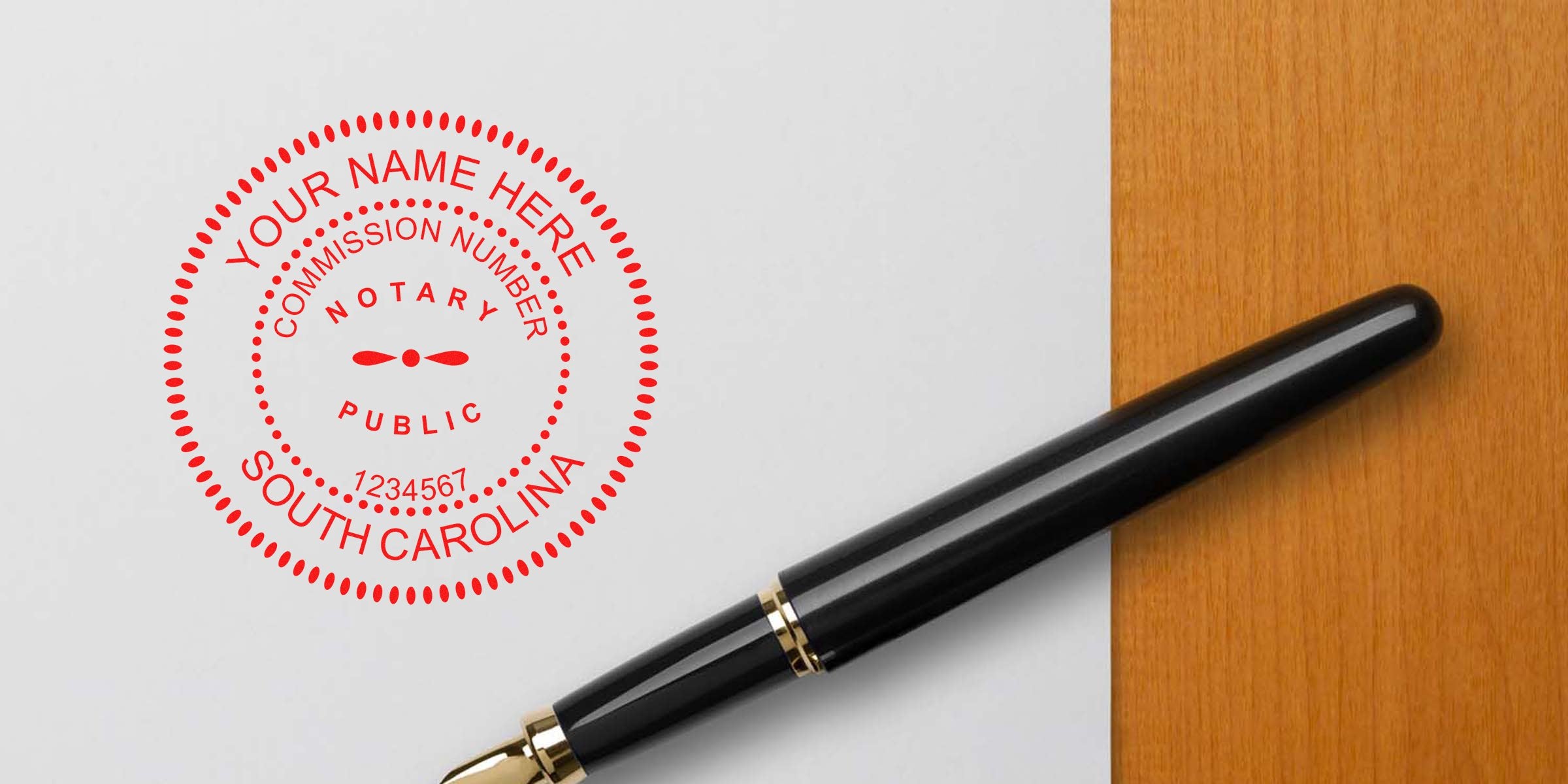 South Carolina notary stamp with commission number and black fountain pen on wooden and white background, essential SC notary supplies.