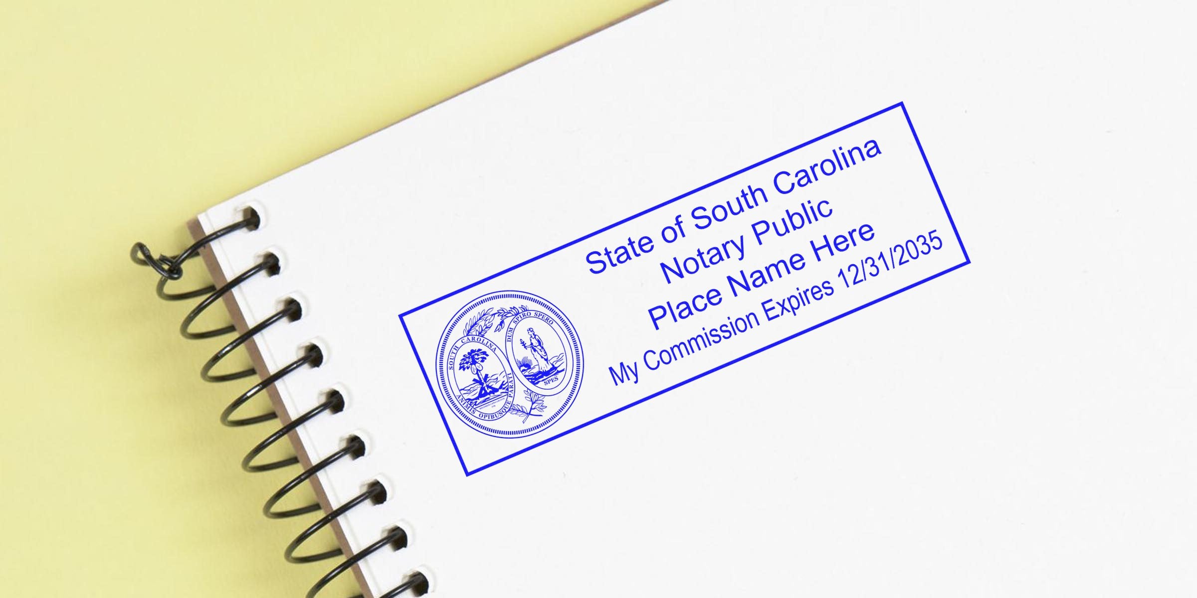 South Carolina notary seal stamped on white notebook for notary public services and commission expiration verification.