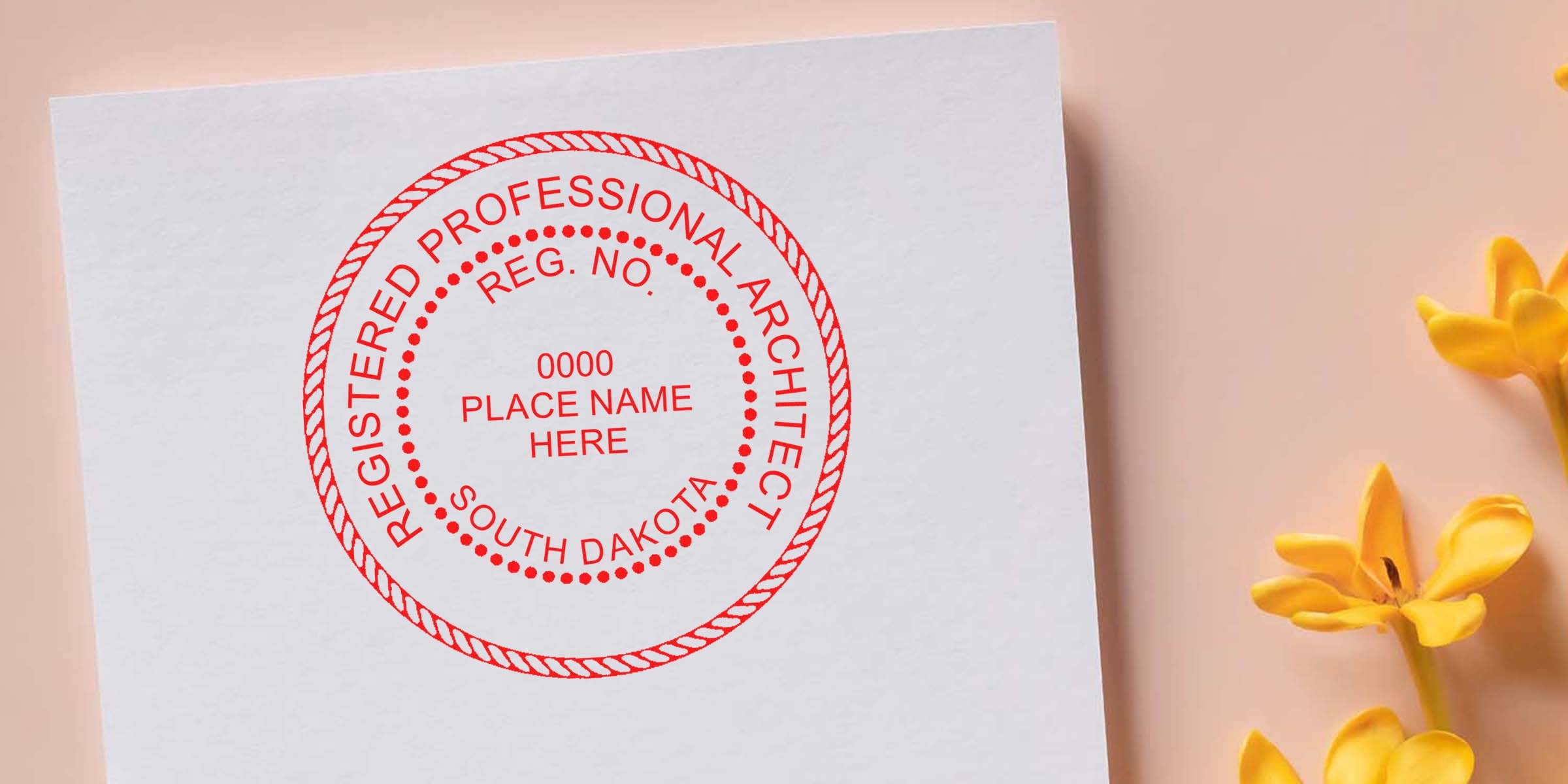 South Dakota architect stamp on white paper with yellow flowers, highlighting trusted architect certification.
