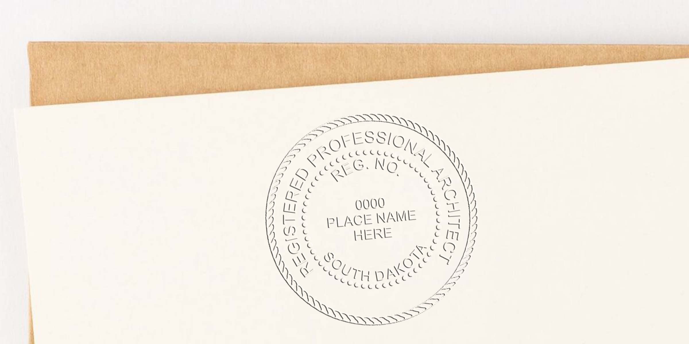 Registered architect certification seal stamp South Dakota on white paper with brown envelope, showing South Dakota architect stamp.