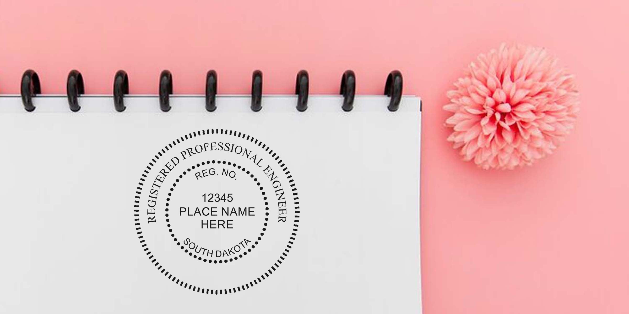 Digital engineer seal and South Dakota engineering stamp on notebook with pink flower backdrop.