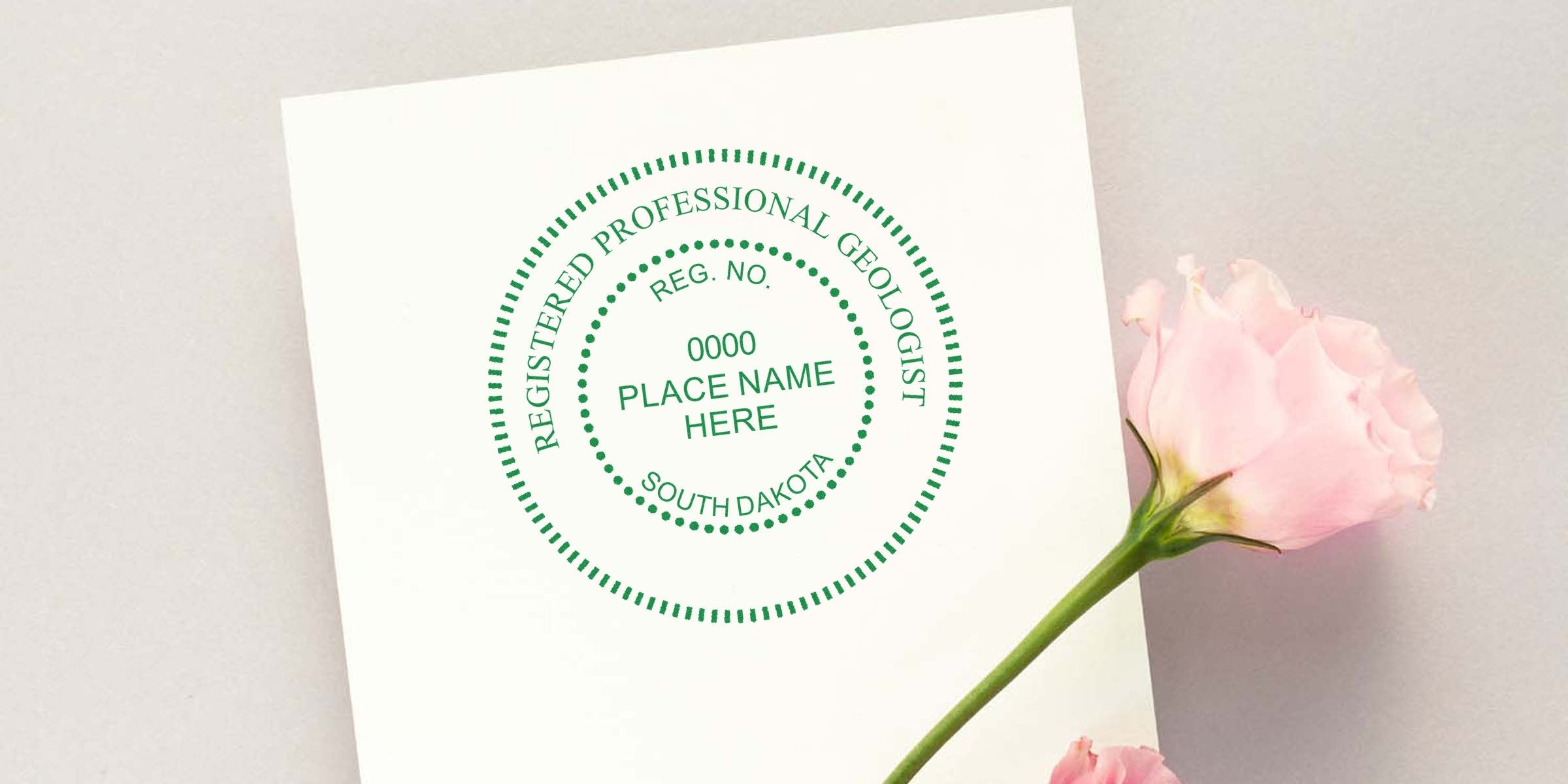 Registered professional geologist seal on white paper with pink rose, featuring South Dakota geologist stamp design and meeting all stamp requirements.