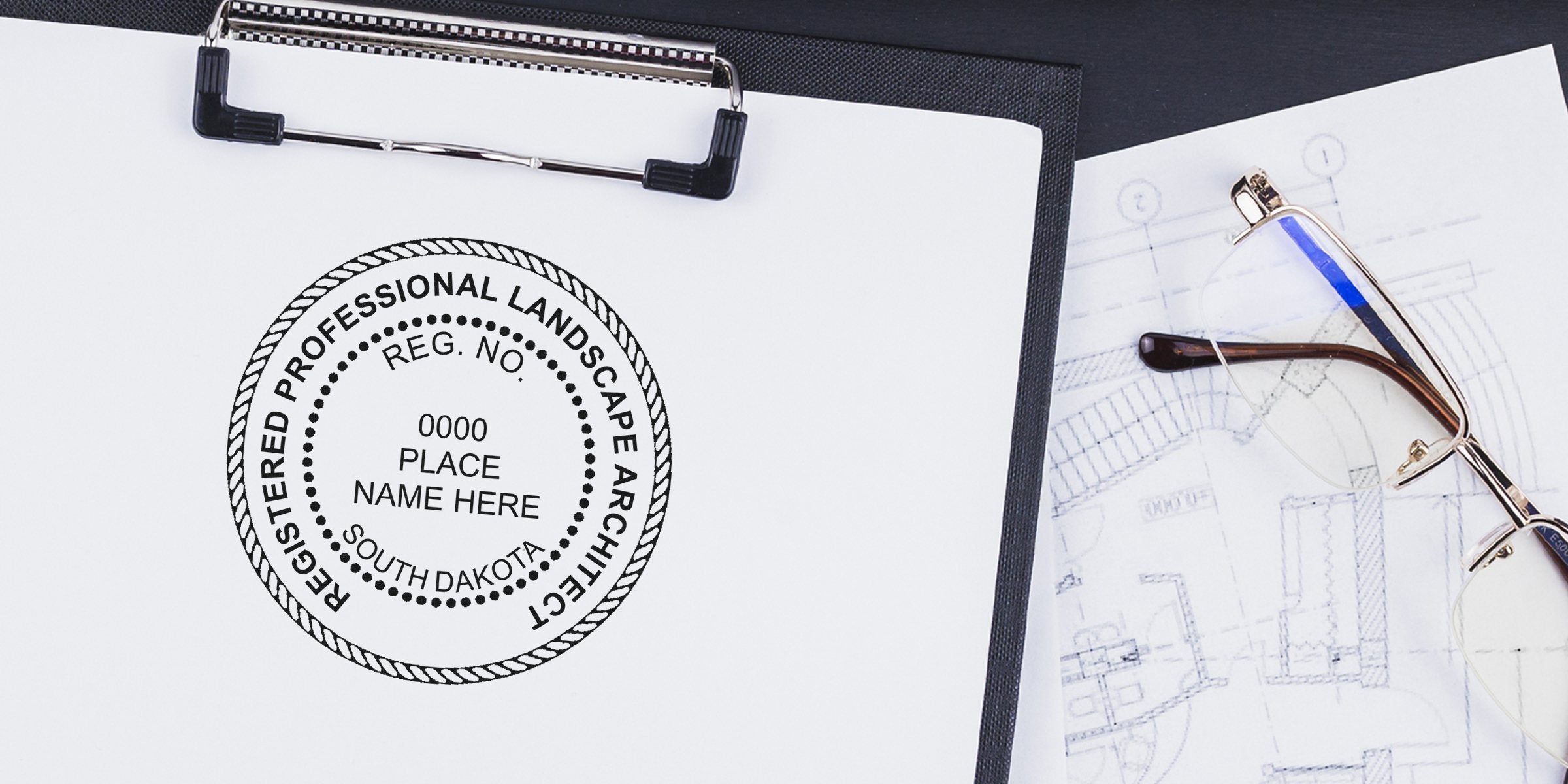 Registered landscape architect stamp on clipboard with blueprint and glasses, highlighting South Dakota stamp costs and postage rates.