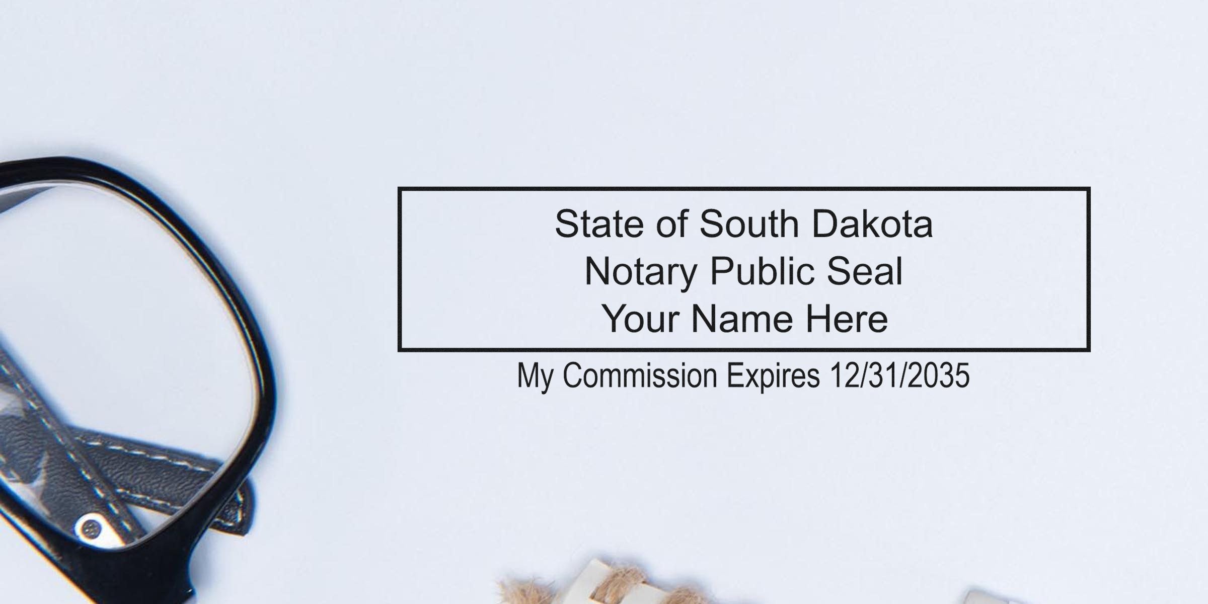 South Dakota notary seal with commission expiration date and eyeglasses on white background, emphasizing notary renewal and stamp requirements.