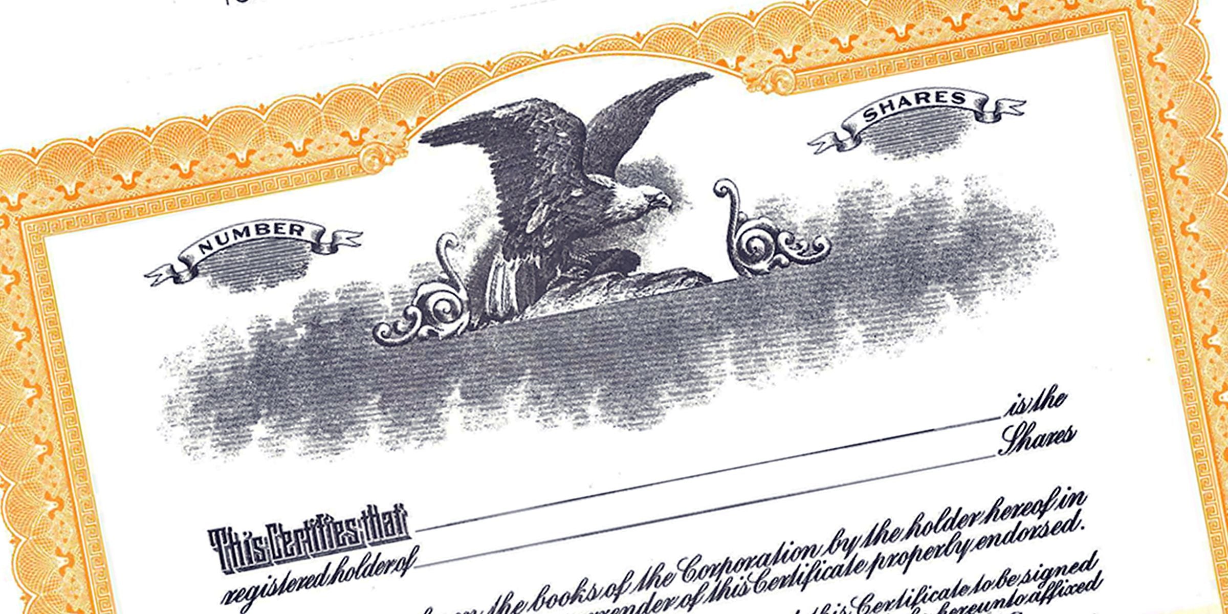 Vintage stock certificate with ornate gold border, eagle engraving, and share number text on paper document