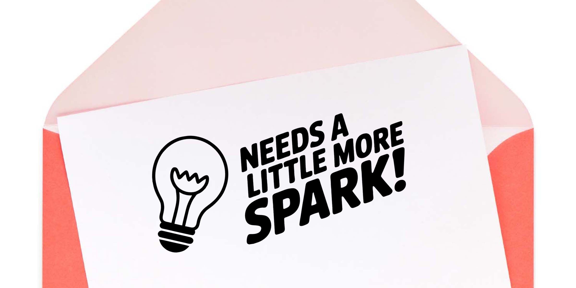 Motivational greeting card in a pink envelope with a lightbulb icon and bold text reading “Needs a little more spark!”