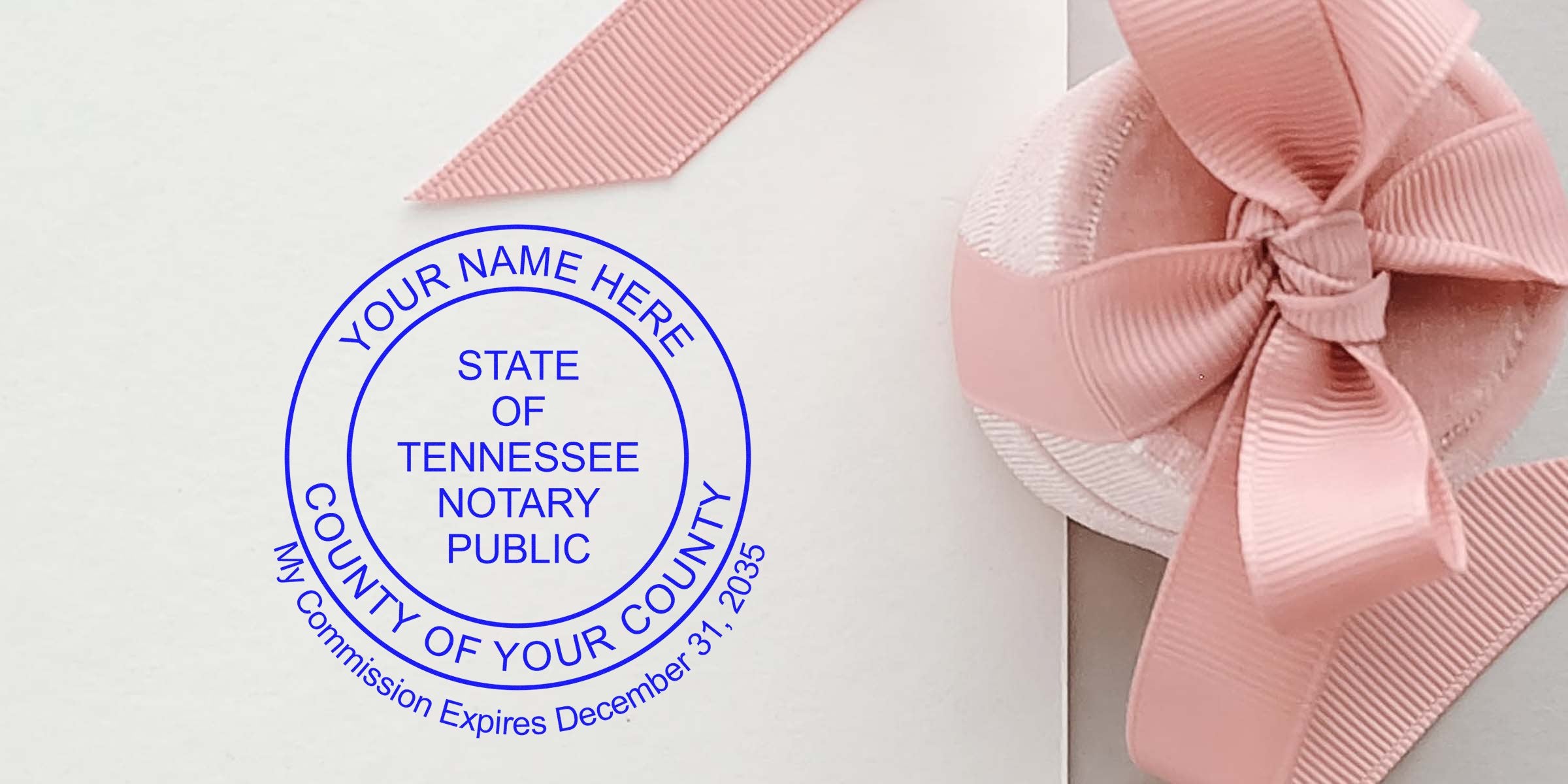Tennessee notary public stamp with pink ribbon on white paper, essential supplies meeting Tennessee notary requirements for official documents.