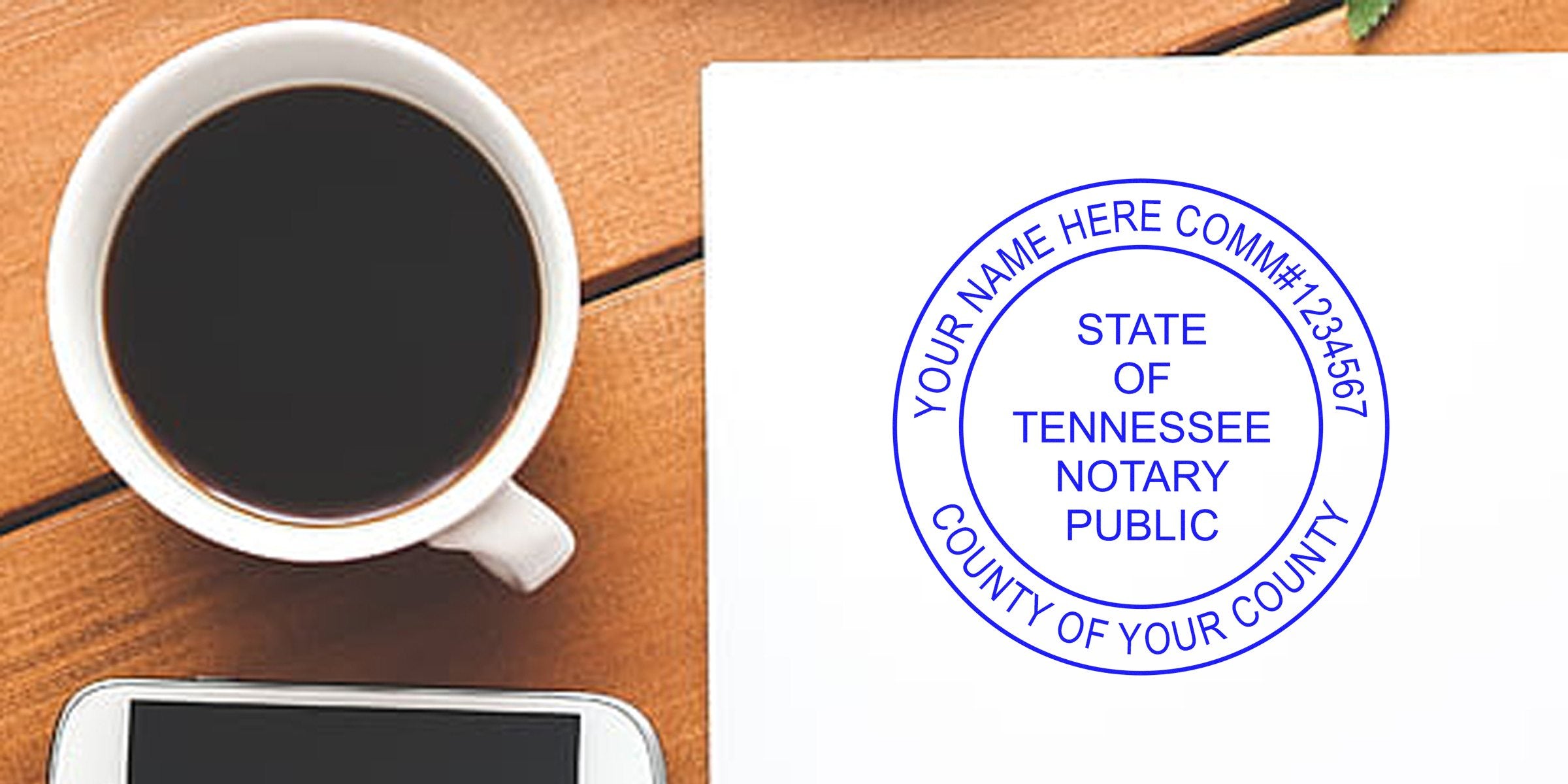 Tennessee notary public stamp on white paper with coffee cup and smartphone on wooden table, showing essential Tennessee notary supplies and tools.