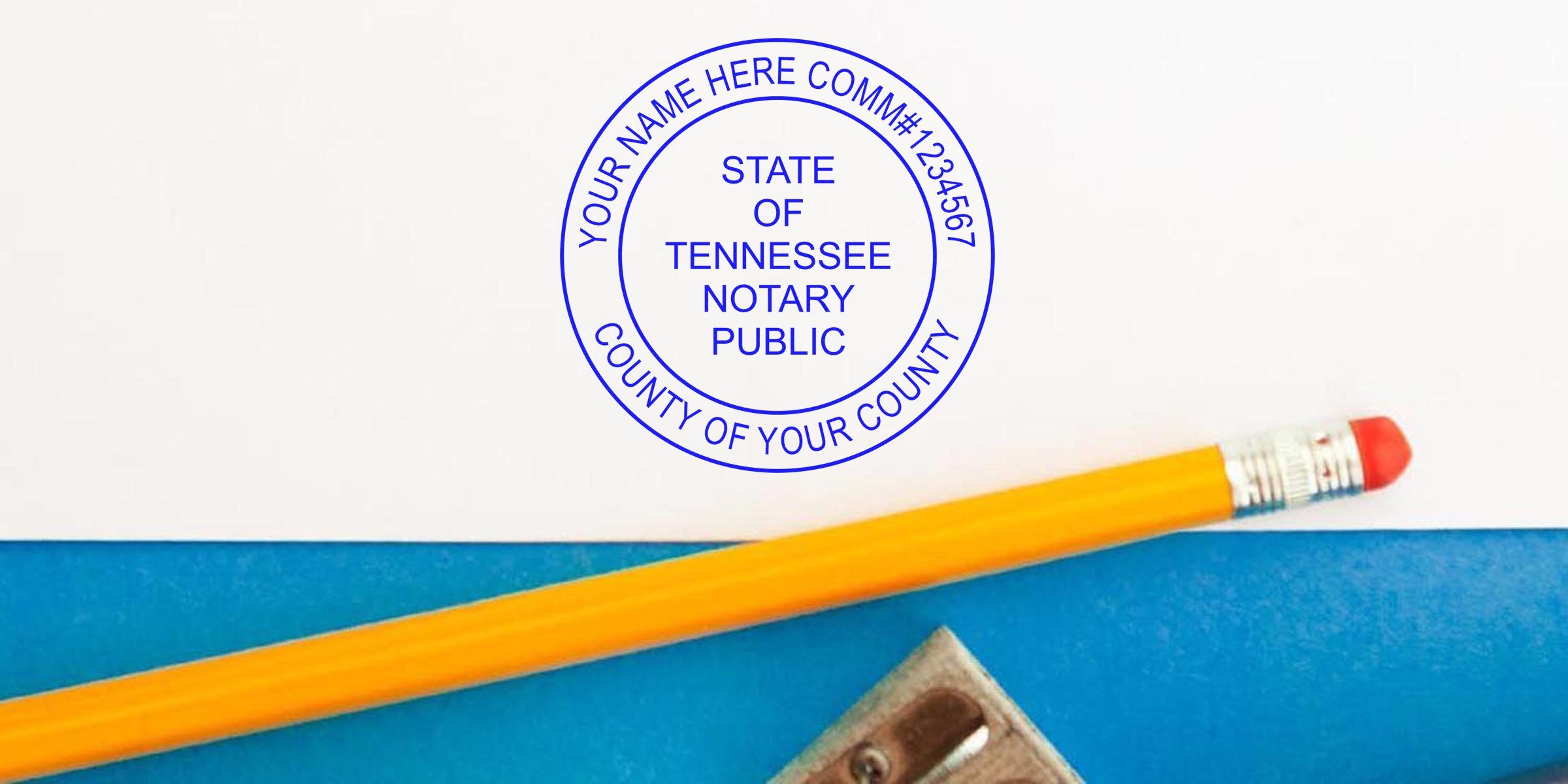 Tennessee notary public stamp on white paper with pencil and sharpener, key TN notary supplies in a complete notary supplies guide.