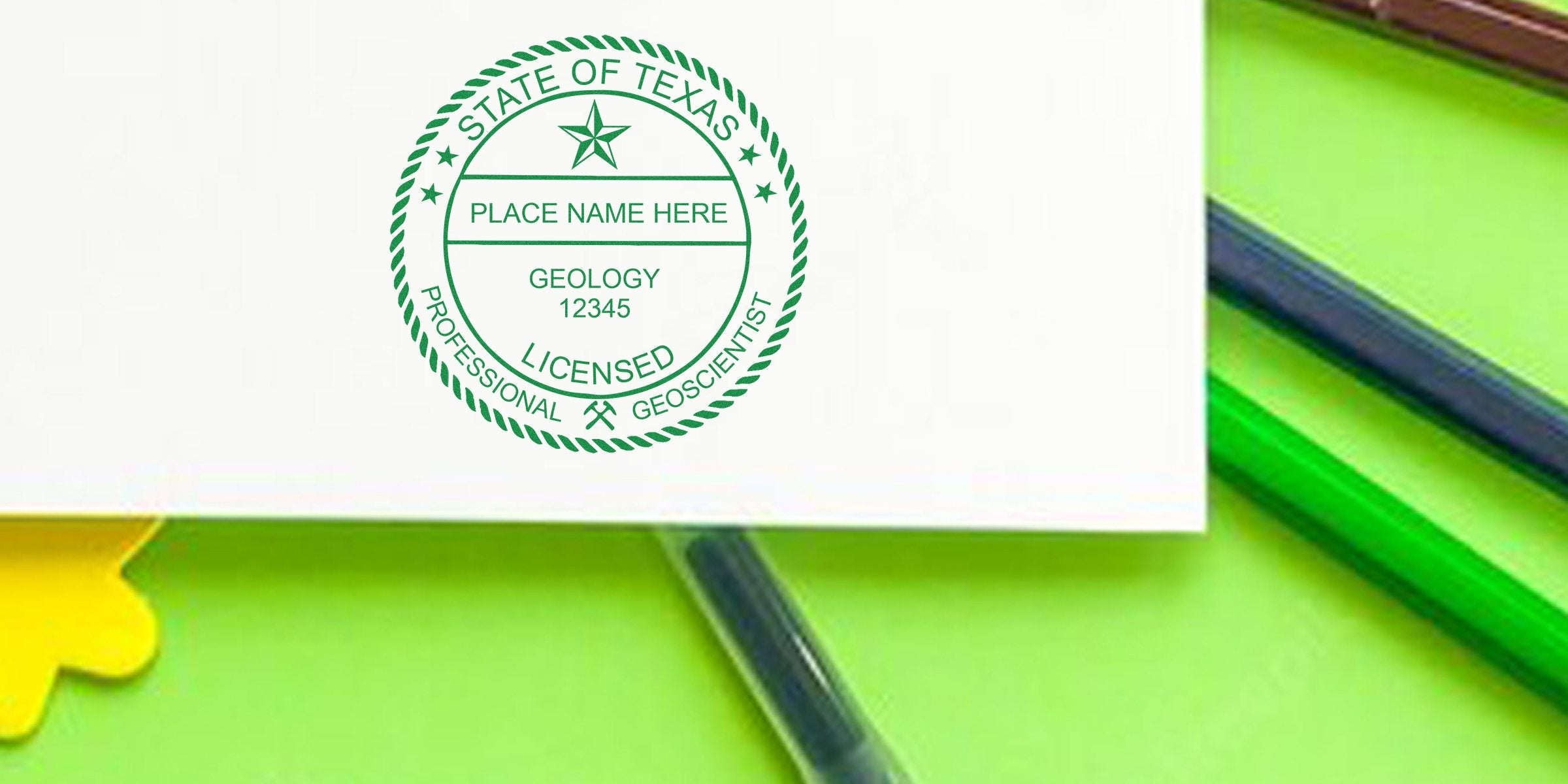 Texas geologist seal on white paper with colorful pens and a green background, featuring a custom geologist stamp design.