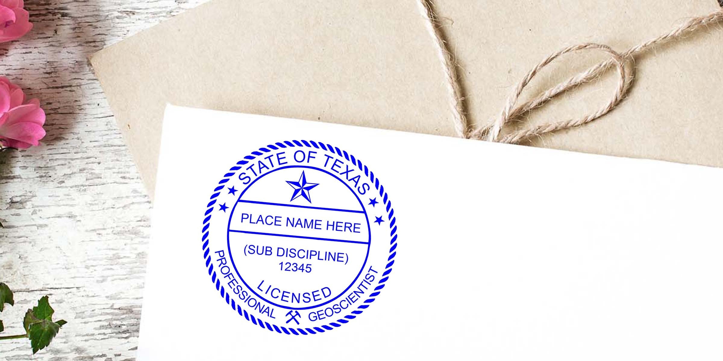 Texas Geologist Stamp on white paper with rustic wood background and pink flowers, showing Texas licensed professional geoscientist seal for Geologist Stamp Application.