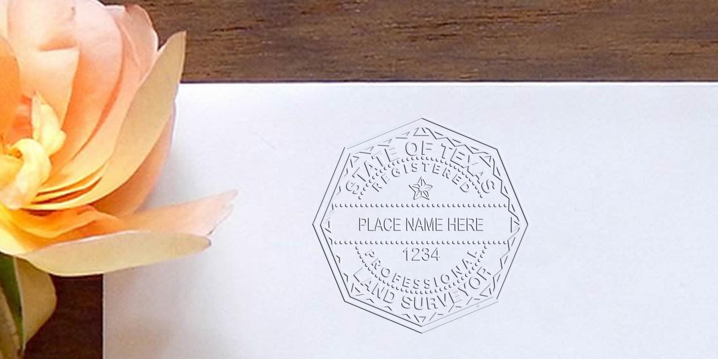 Texas land surveyor seal embossed on white paper with a peach flower, placed on a wooden table, adhering to land surveyor seal guidelines.