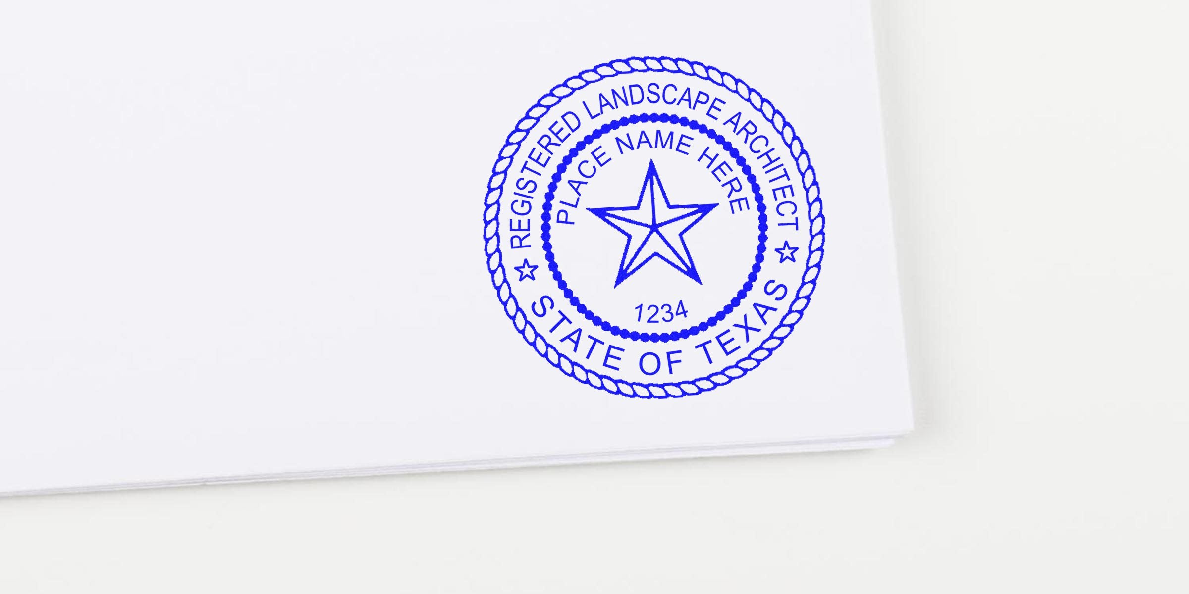 Texas landscape architect stamp on white paper with the official Texas registered landscape architect seal; tips on avoiding common stamp size errors.