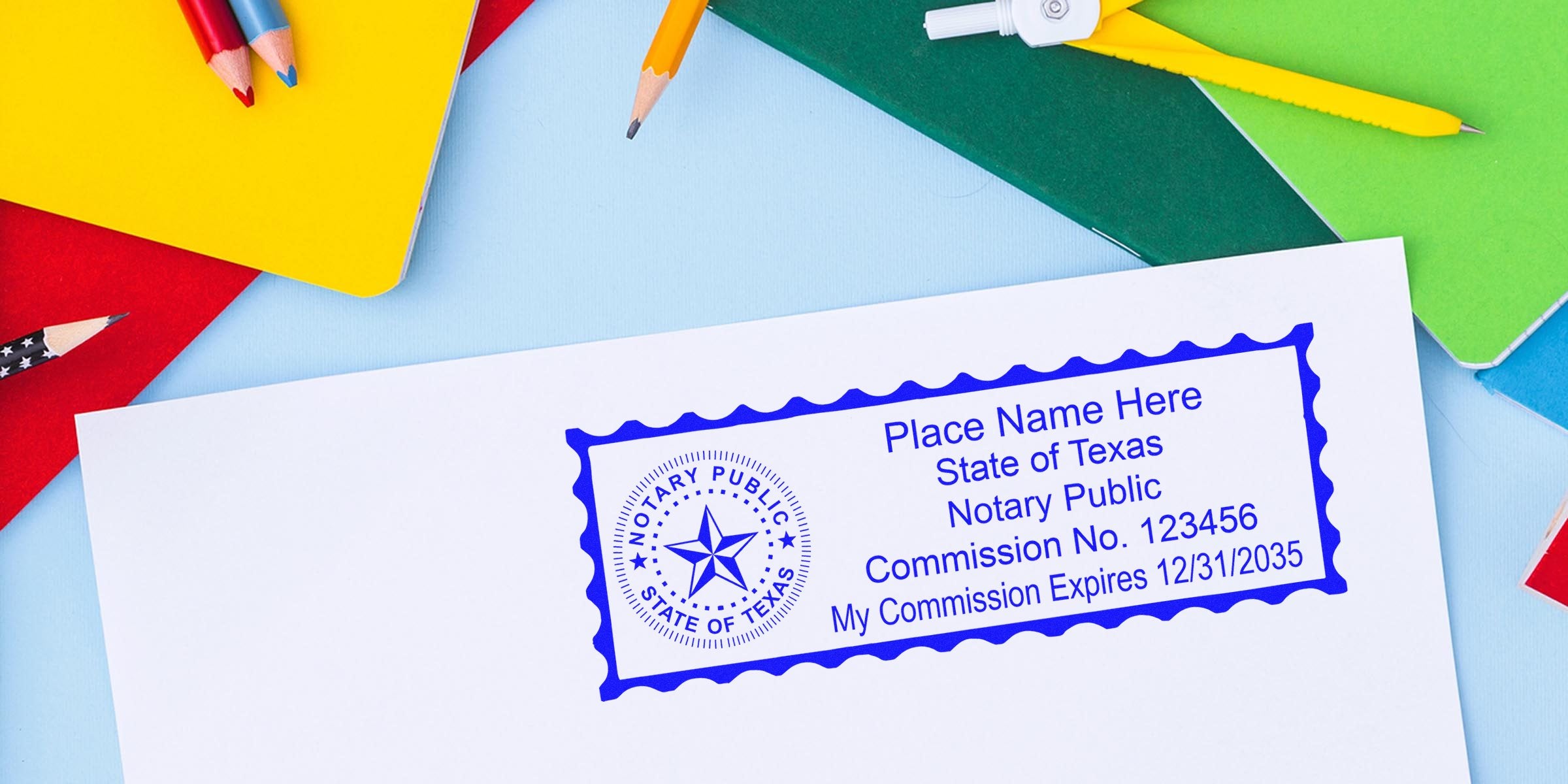 Texas notary stamp on white envelope with colorful notebooks and pencils, showcasing the advantages of a self-inking notary.