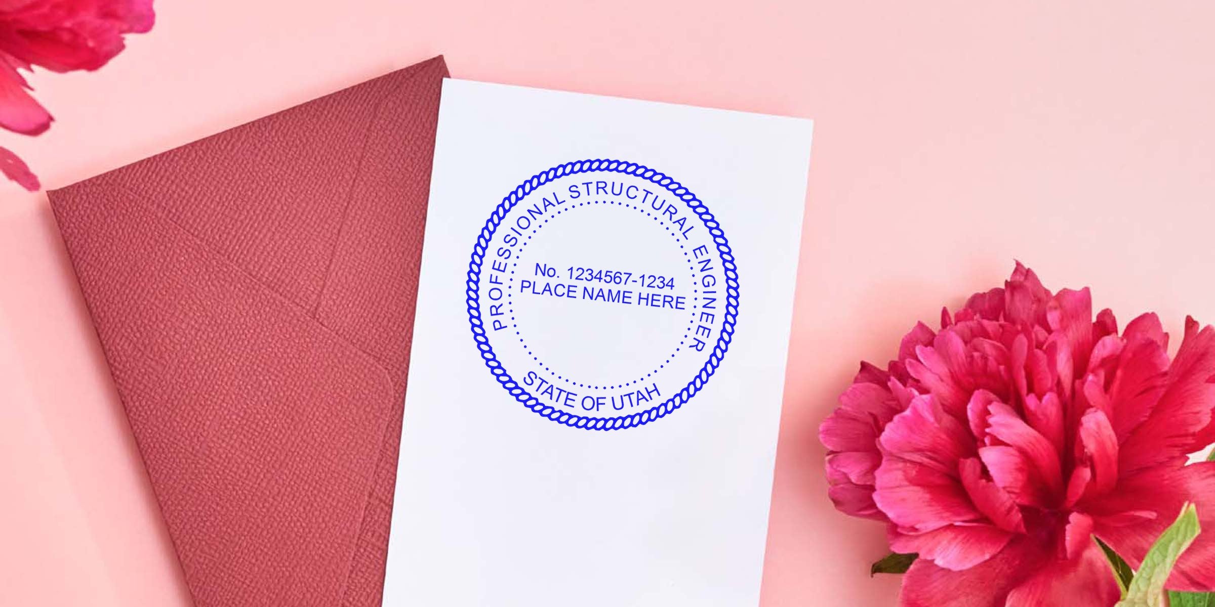 Utah engineer seal stamp on white paper with pink envelope and red flower background, meeting Utah engineer stamp standards.
