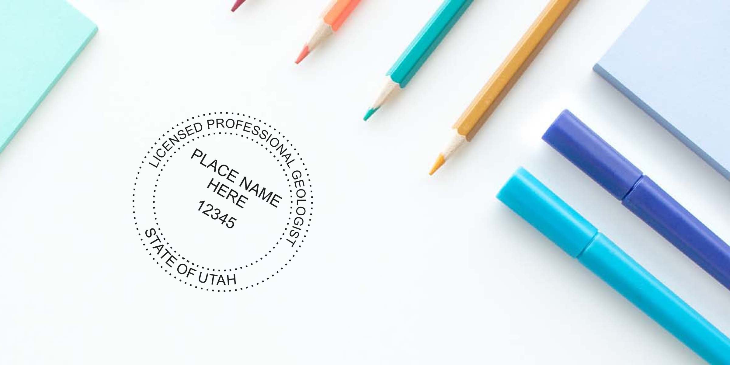 Utah Geologist Stamp with licensed professional geologist seal, colorful pencils, and markers on a white desk, displaying a geology certification stamp template.