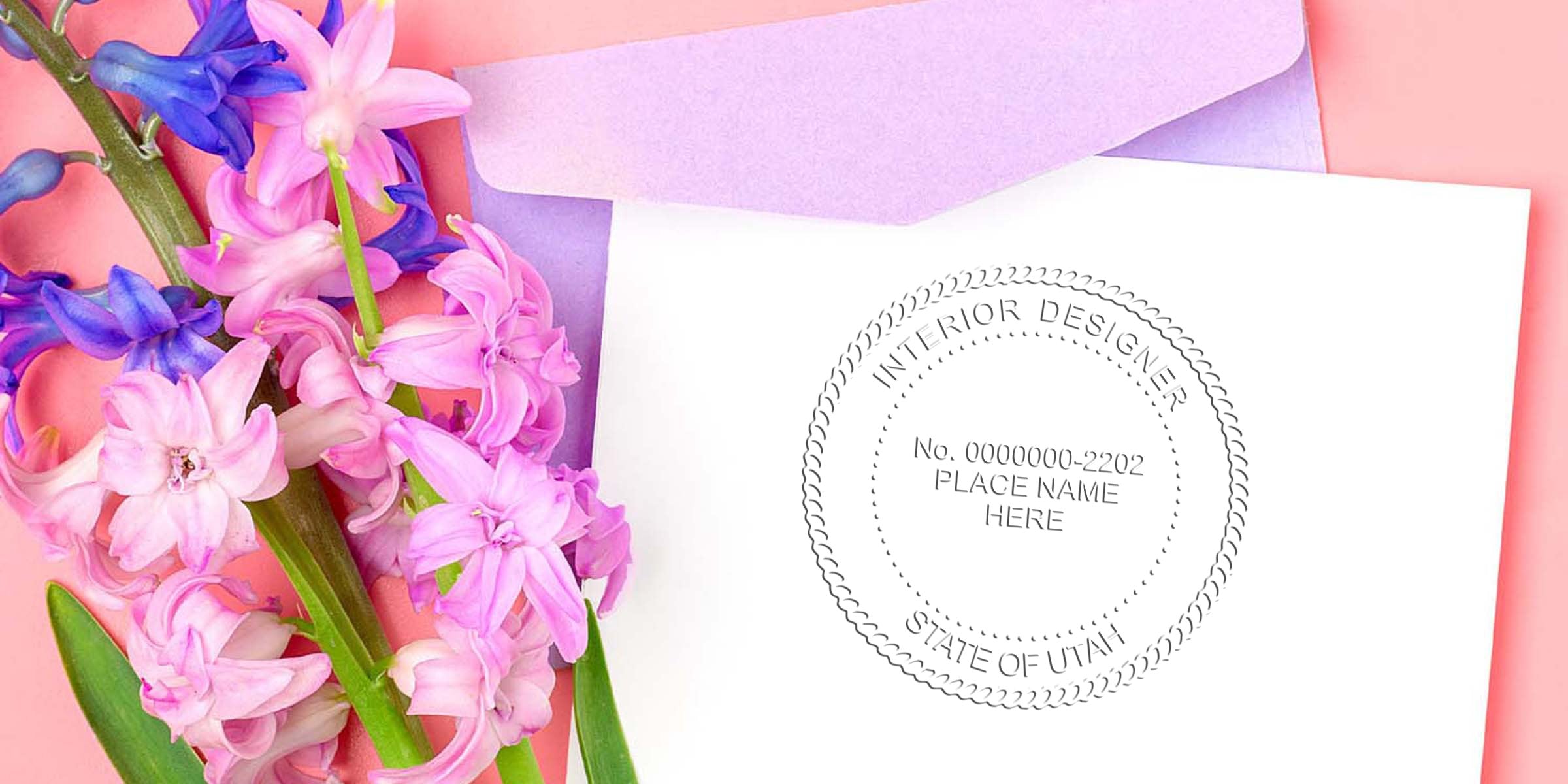 Pink and purple hyacinths next to a lavender envelope and white card with an interior designer stamp, against a spring floral backdrop, highlighting Utah interior designer regulations and seal requirements.