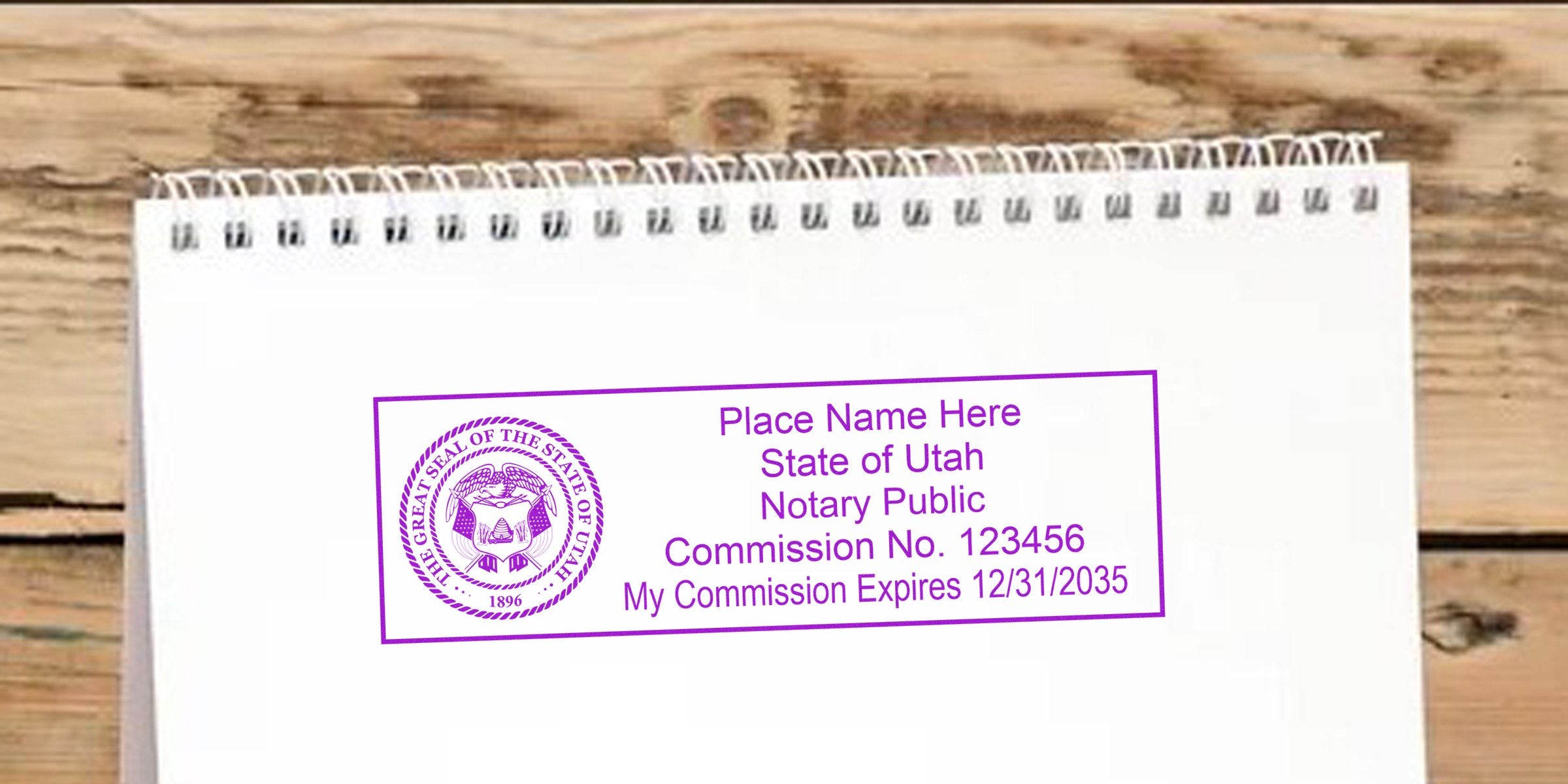 Utah notary seal with commission number and expiration date on white notepad. Purchase your notary seal online today.