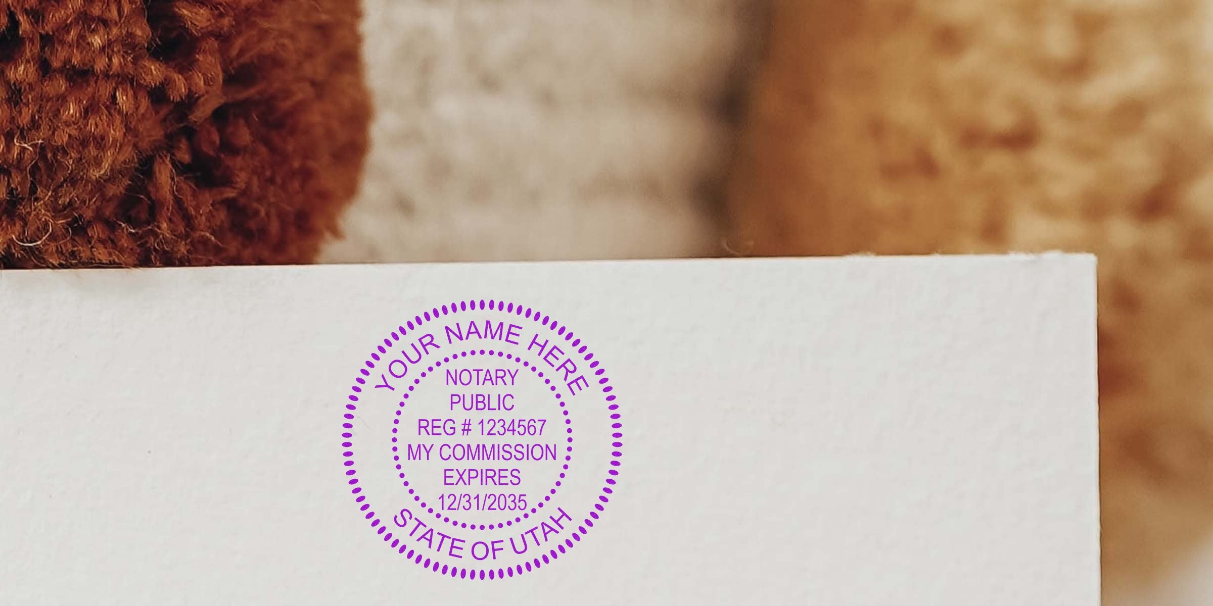 Utah notary stamp on white paper showing official seal, commission expiration, and registration number.